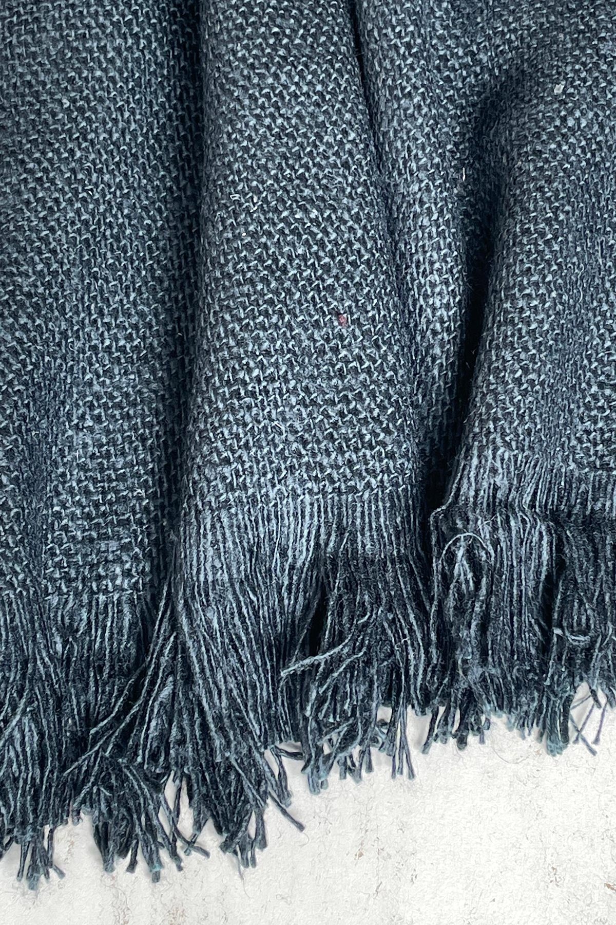 Close-up texture of Bibek banana fibre scarf in slate blue