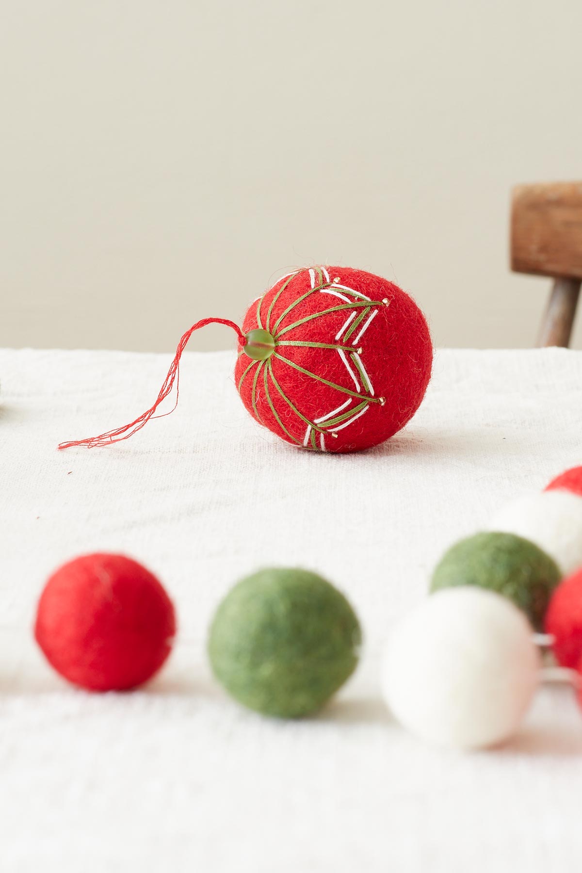 Lifestyle felt bauble in berry red