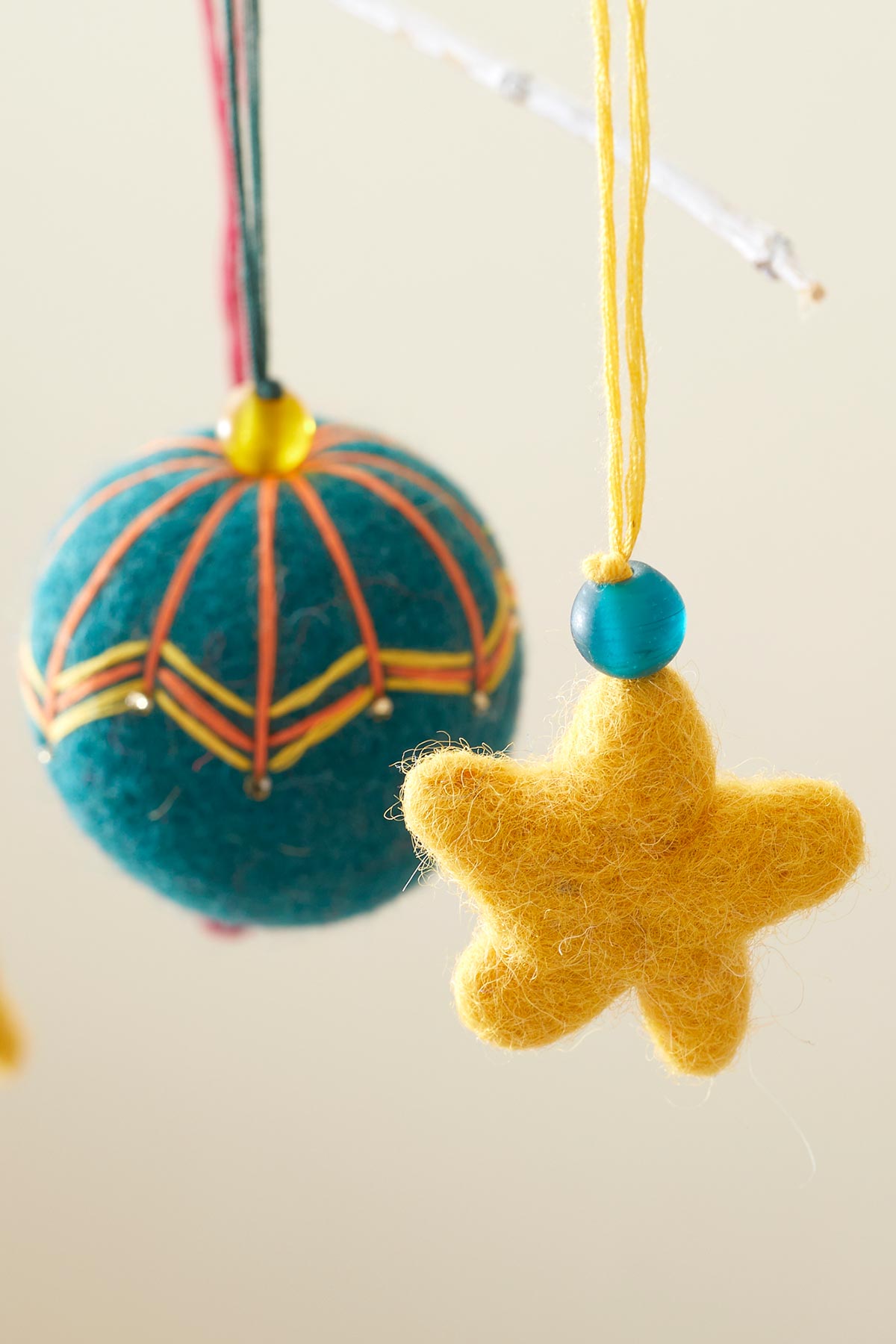Hanging felt bauble in teal green