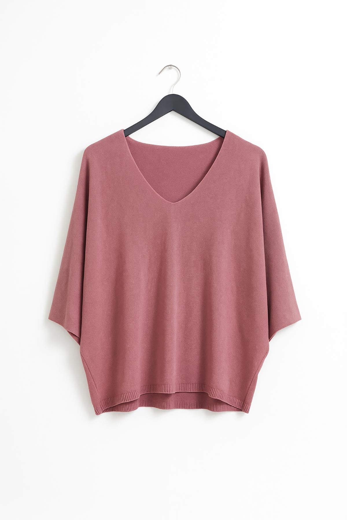 Close-up of Aria knit top showing fine texture and soft modal blend