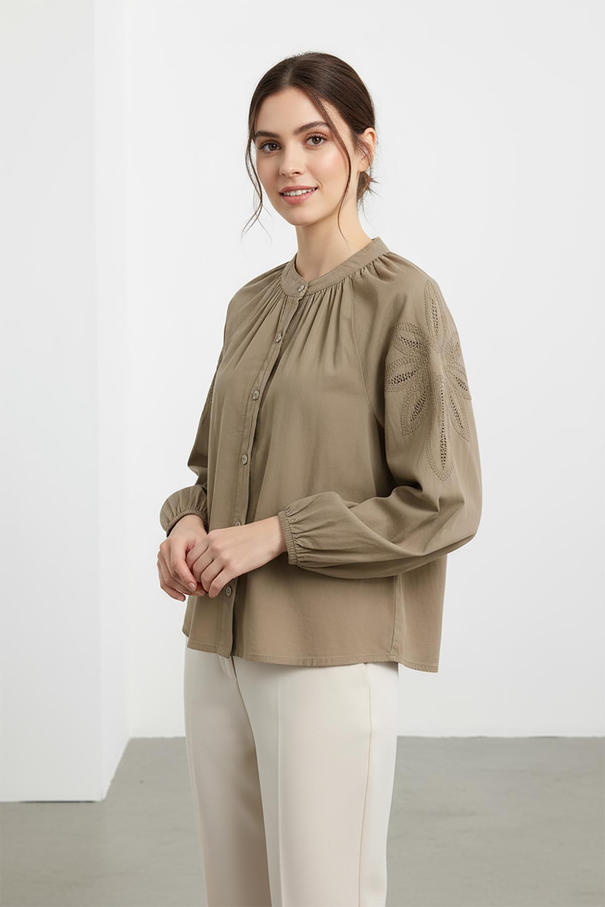 Close-up of Aurelia Cotton Lace Blouse showing lace embroidery on sleeve