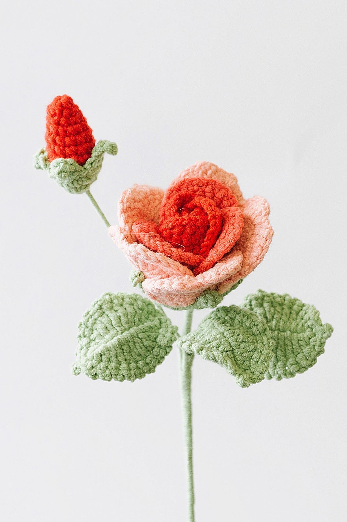Baby rose crochet flower stem handmade in cotton yarn, styled for soft romantic home décor at Urban Wild