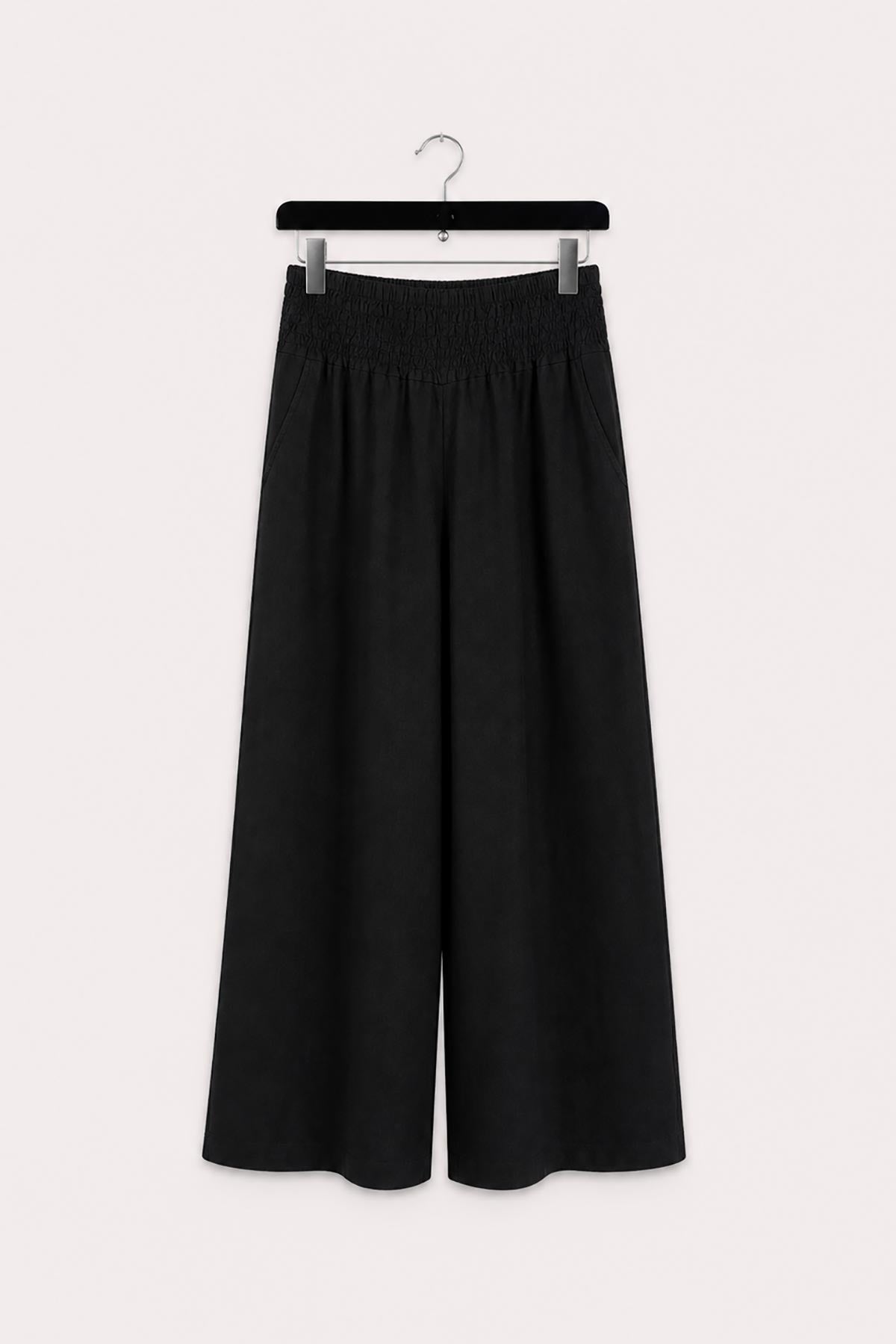 Black linen palazzo trousers with shirred waist by Urban Wild