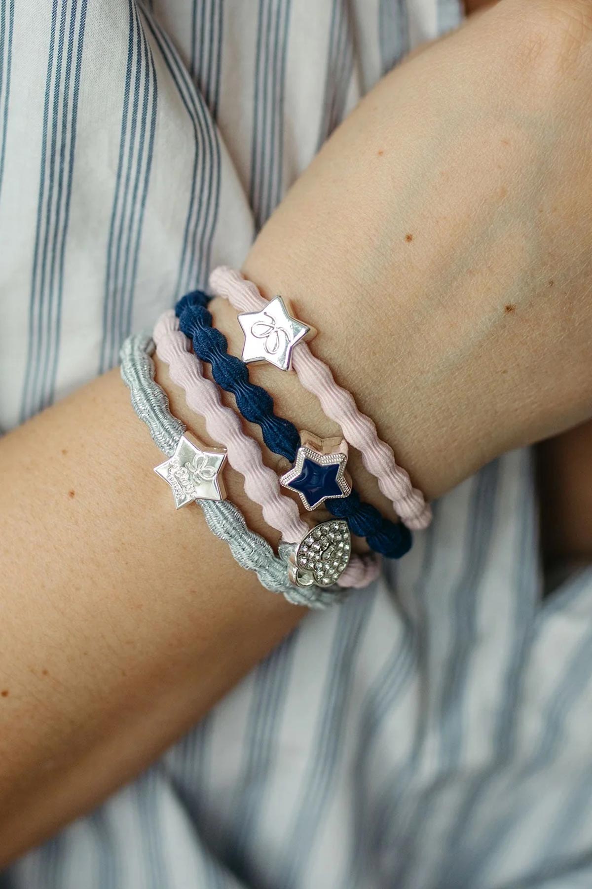 By Eloise soft pink Bangle Band styled on the wrist