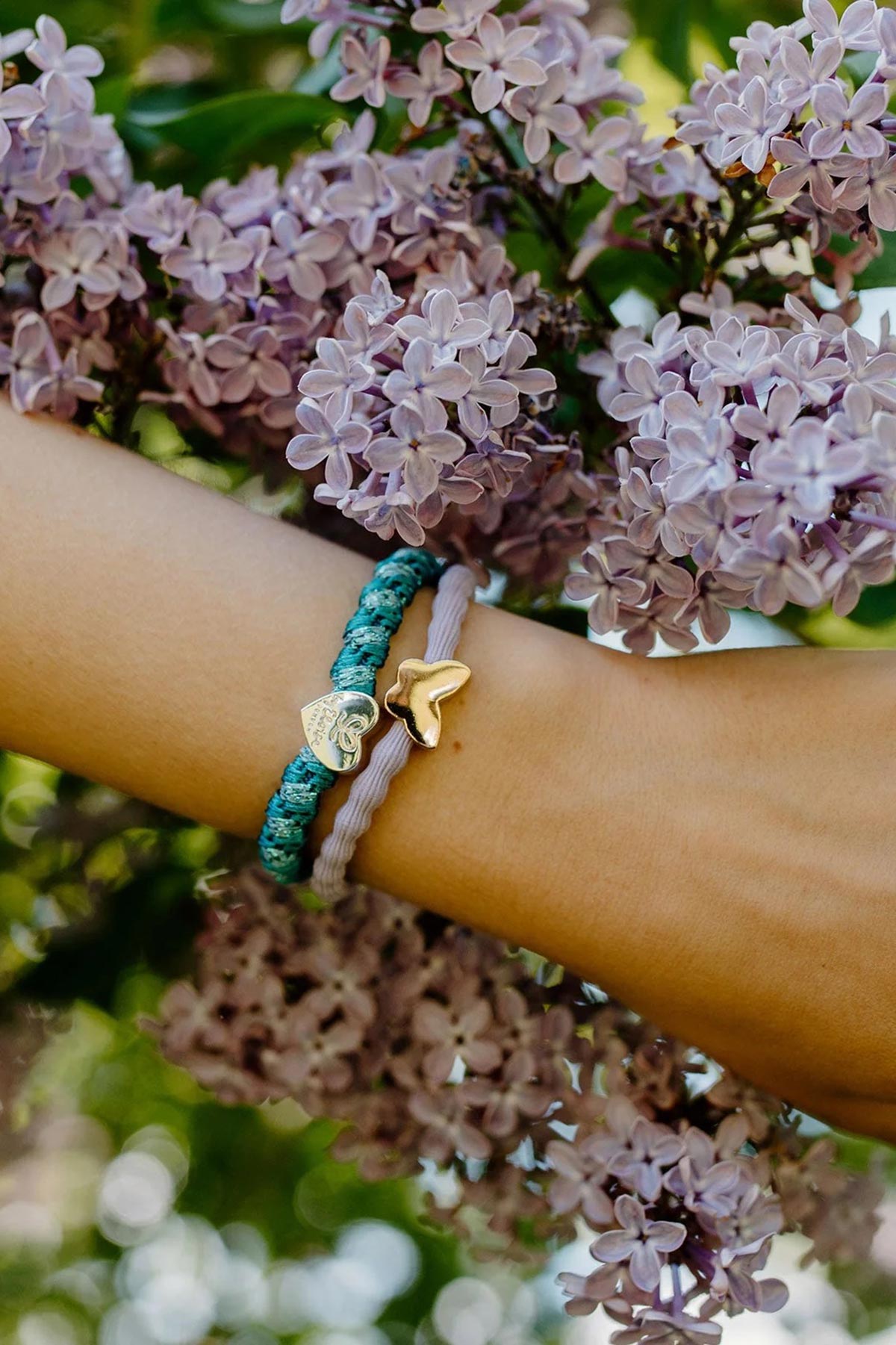 Lavender bangle band worn on wrist