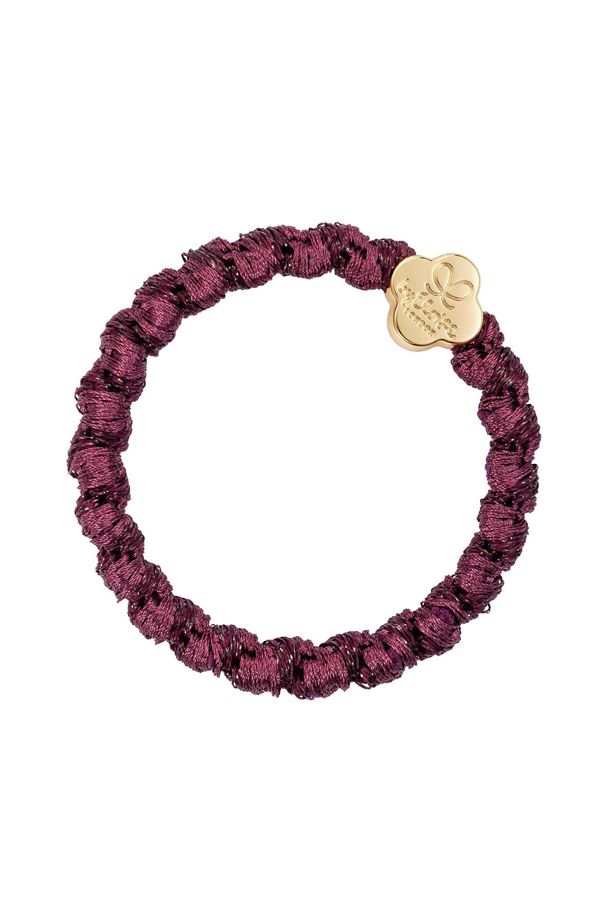By Eloise Plum Gold Quatrefoil Woven Bangle Band shown as a stylish hair tie bracelet