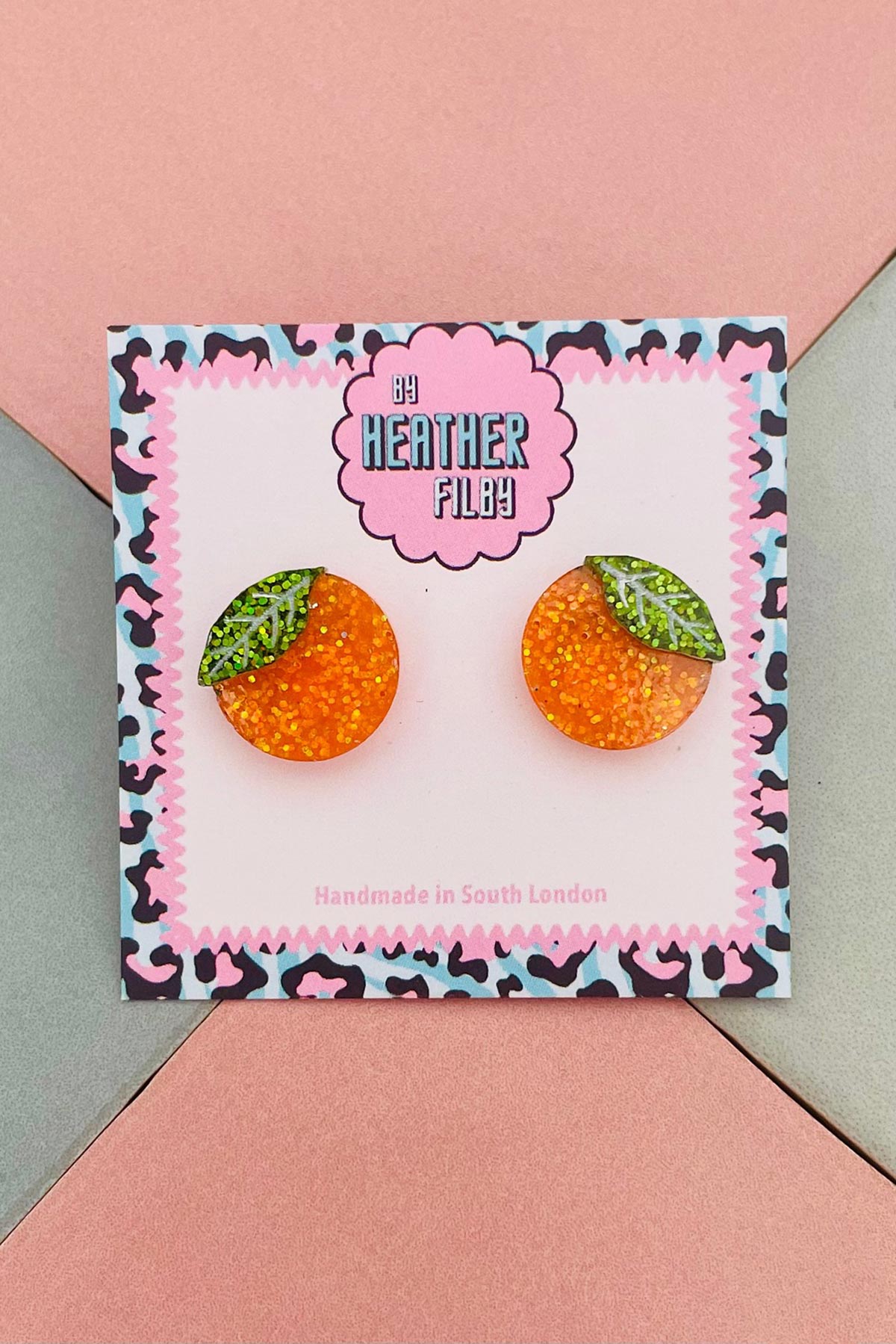By Heather Filby orange stud earrings