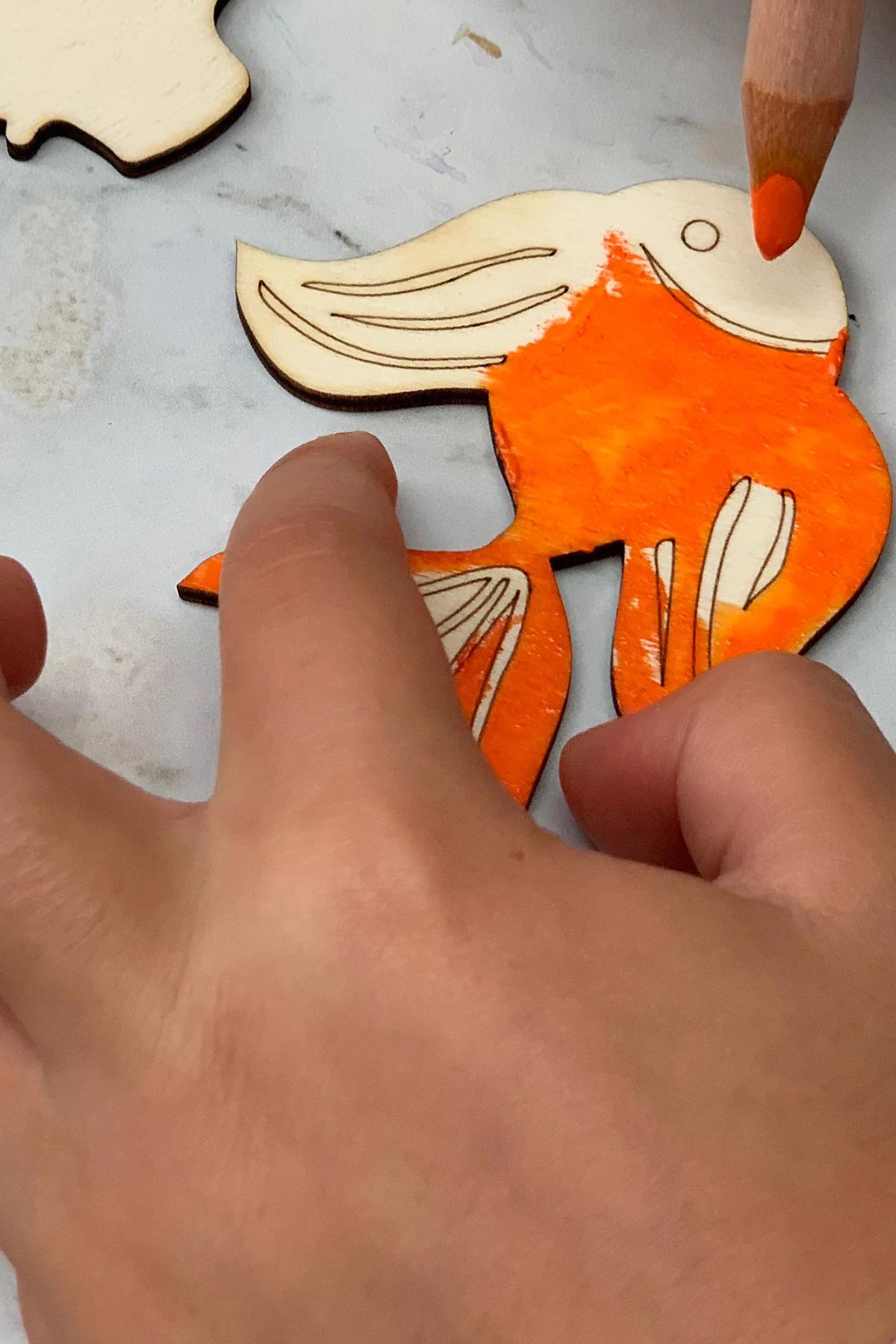 Child creating ocean characters