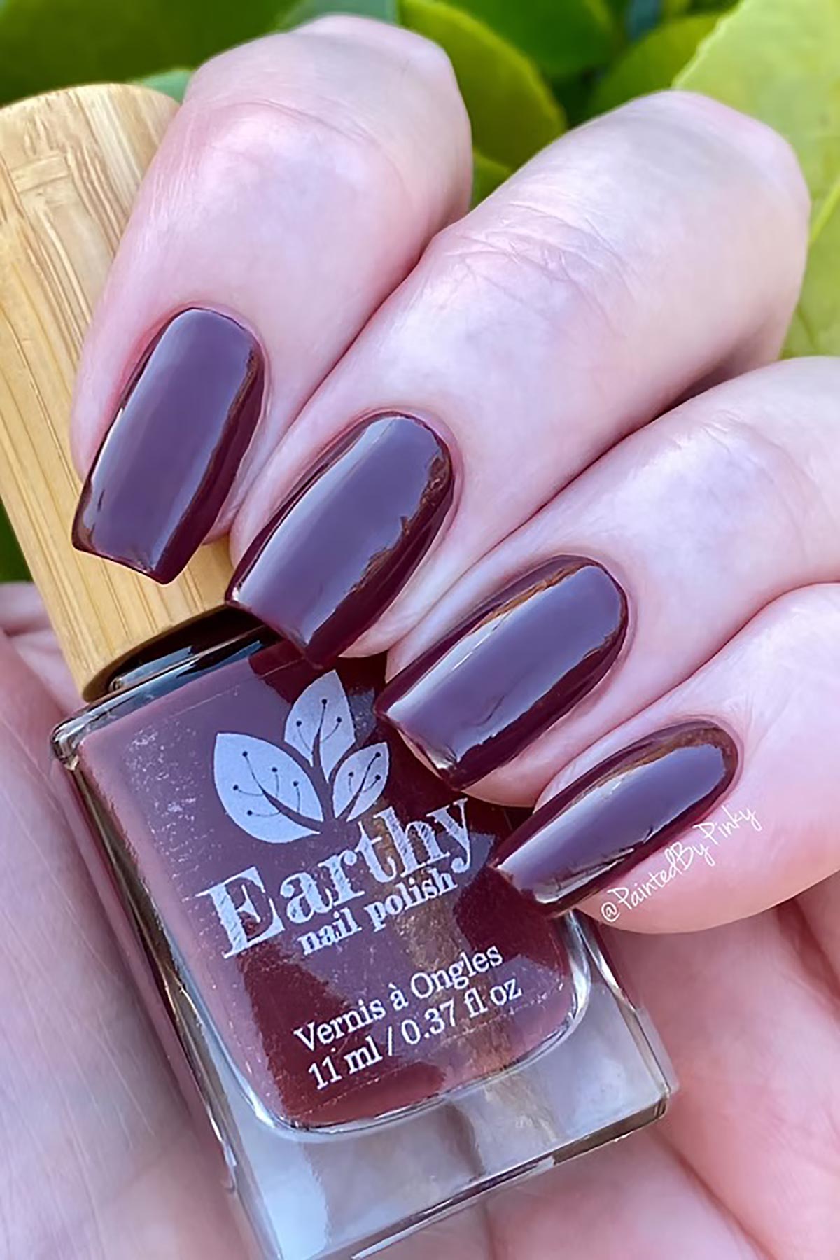 Earthy Bordeaux Nail Polish swatch deep red shade lifestyle