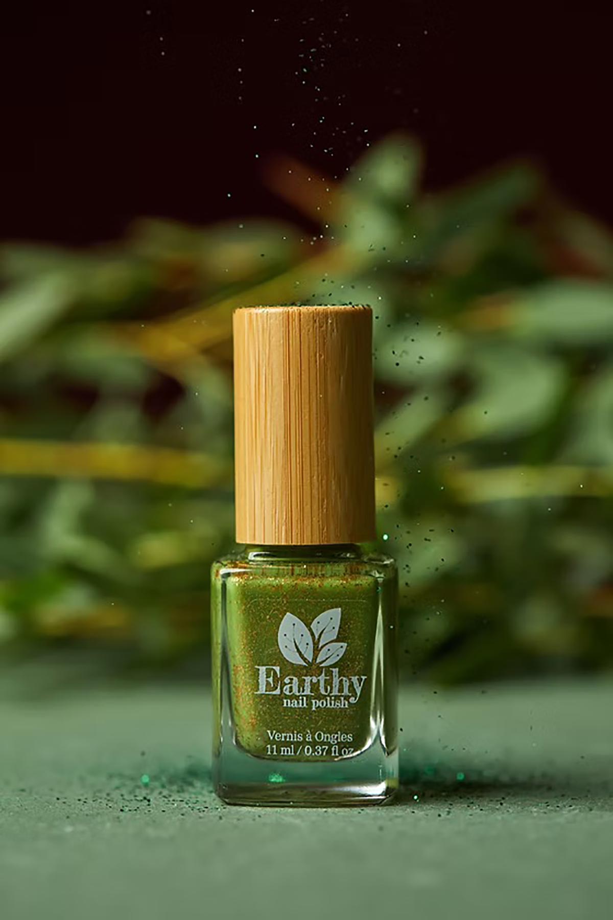 Earthy Shimla Nail Polish swatch lifestyle bottle
