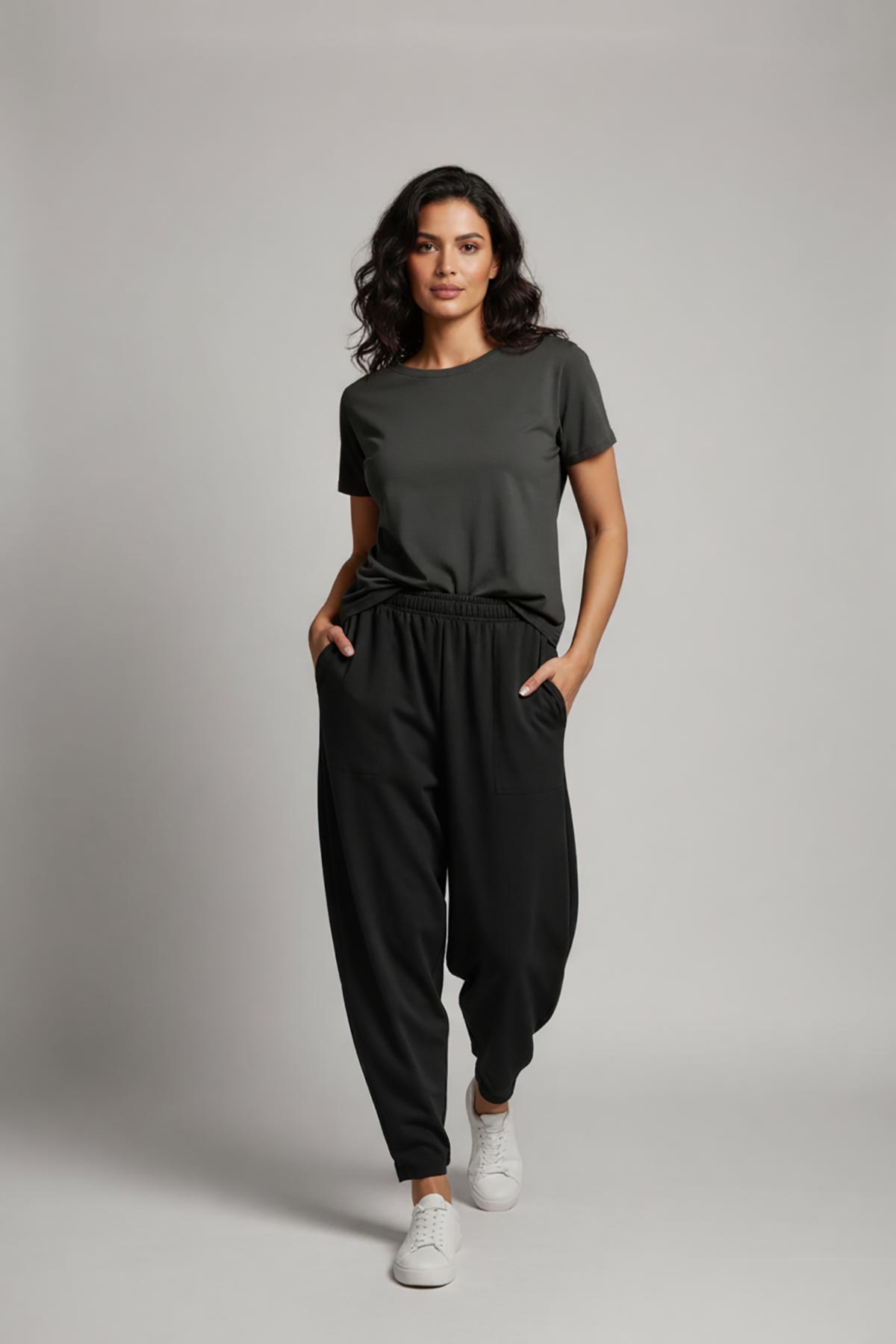 Black cotton joggers styled with t-shirt and trainers