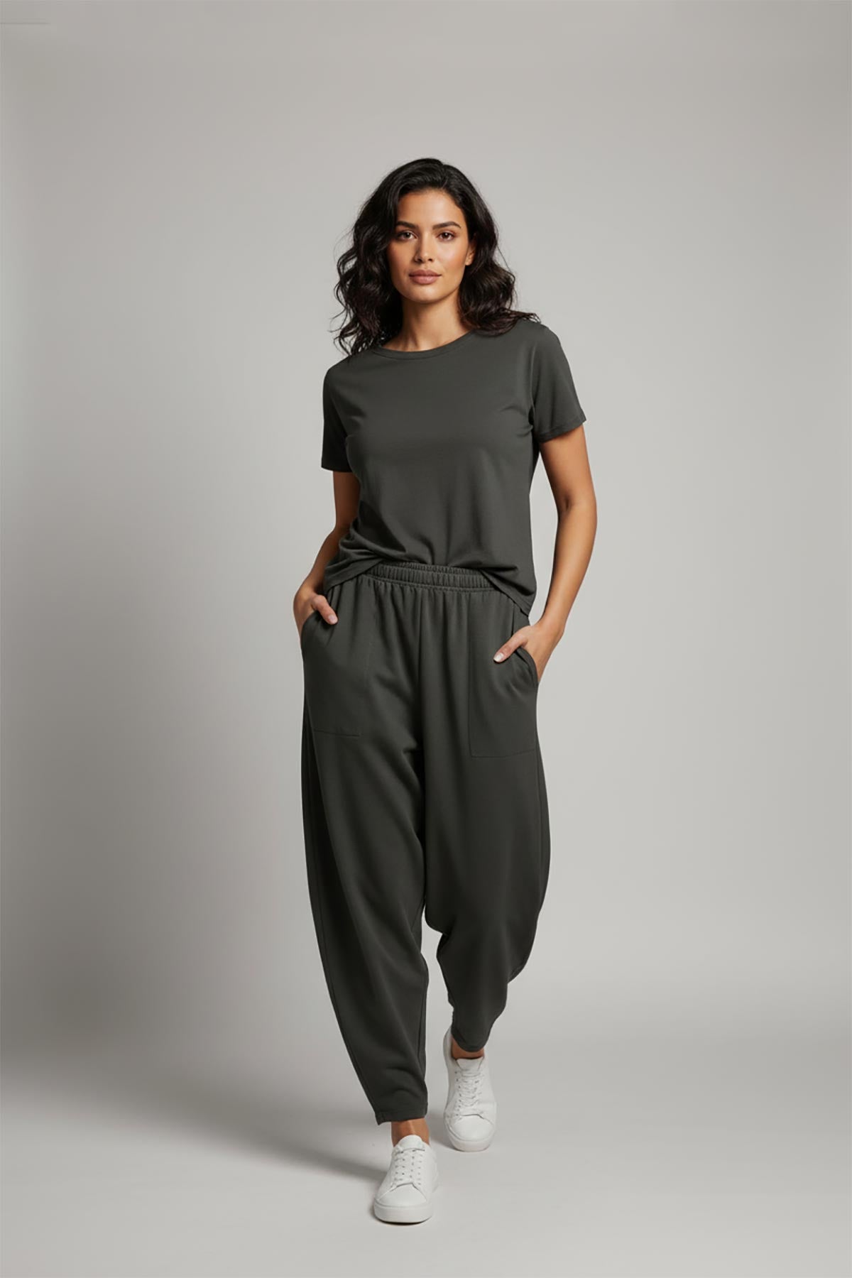 Green cotton joggers styled casually for everyday wear