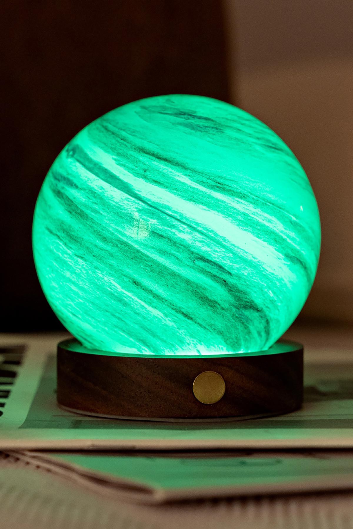 Glowing cloud-like glass light in Polar Cloud design green