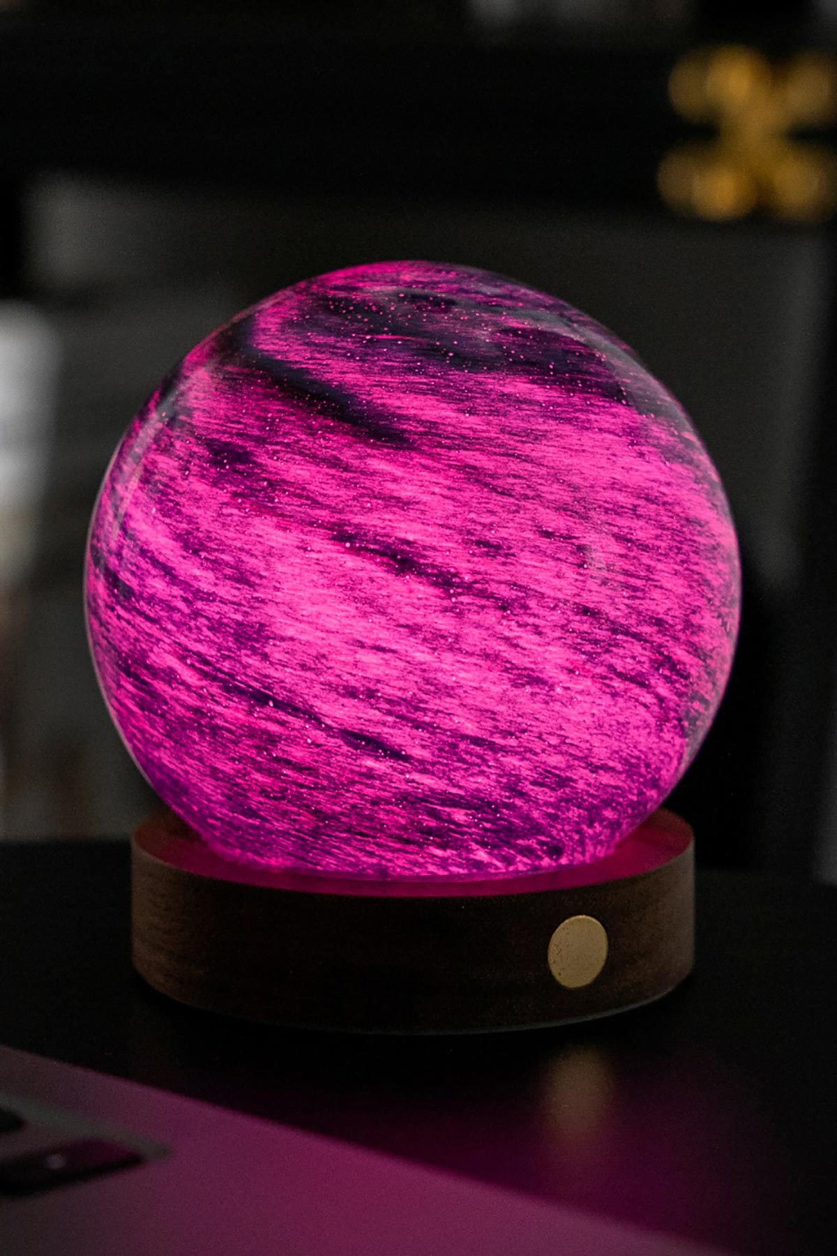 Illuminated pink Stellar Ocean LED glass orb