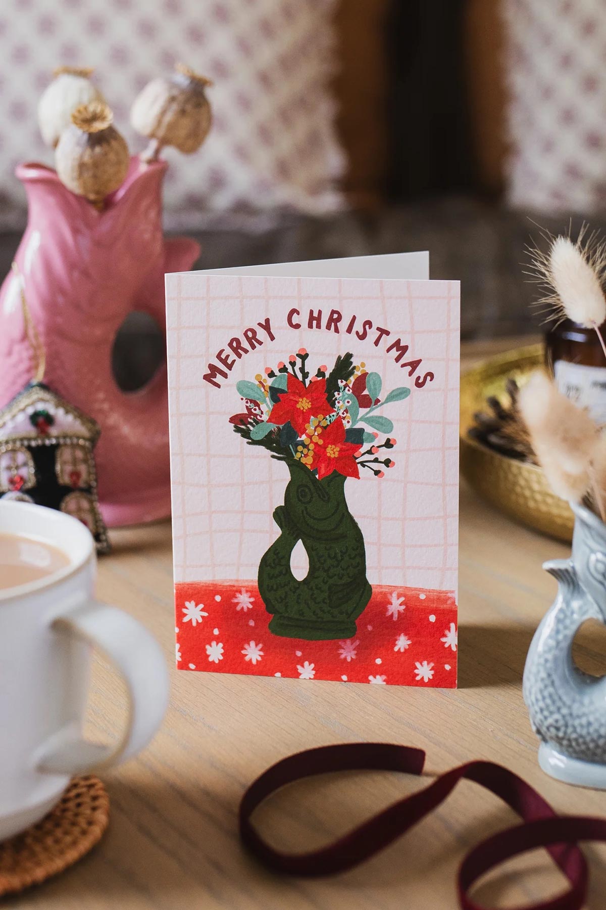 Gluggle Jug Merry Christmas card with floral arrangement illustration lifestyle