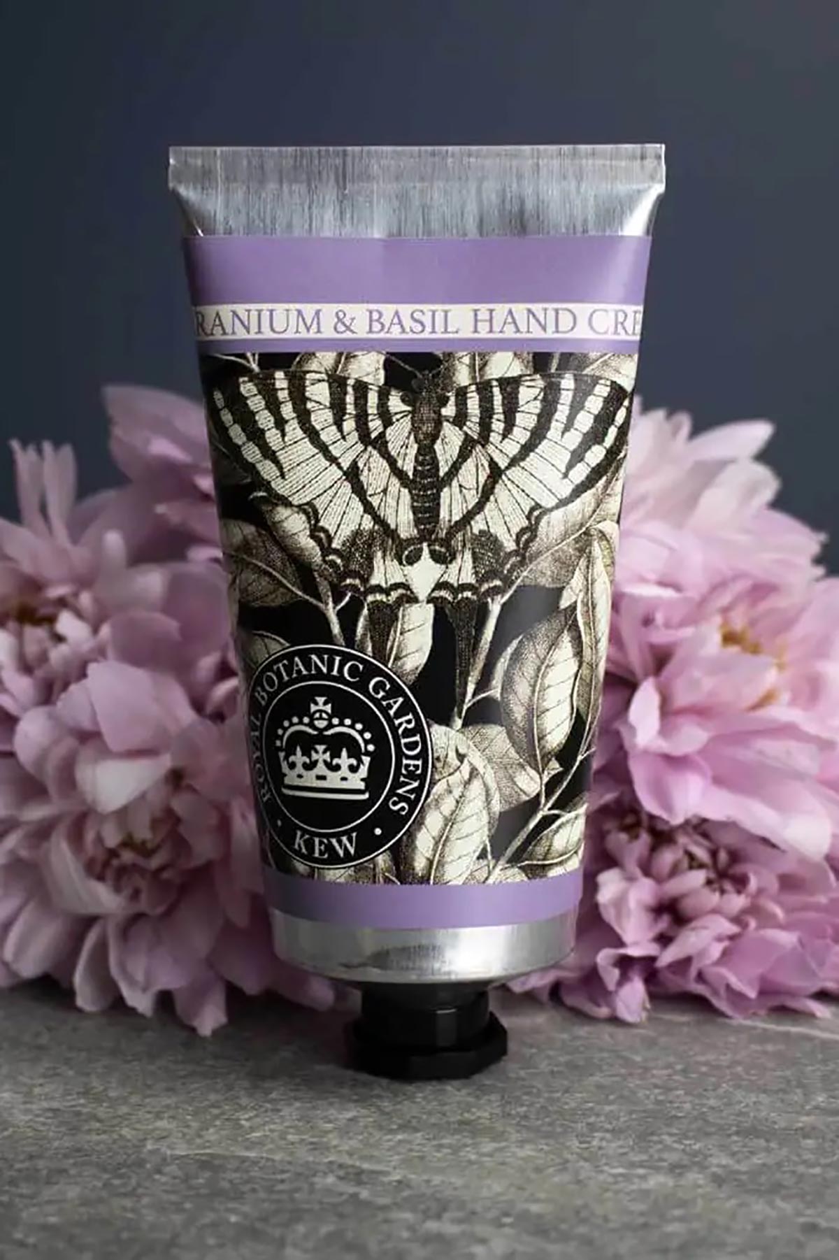 Close-up detail of Kew Gardens Geranium and Basil Hand Cream floral tube design