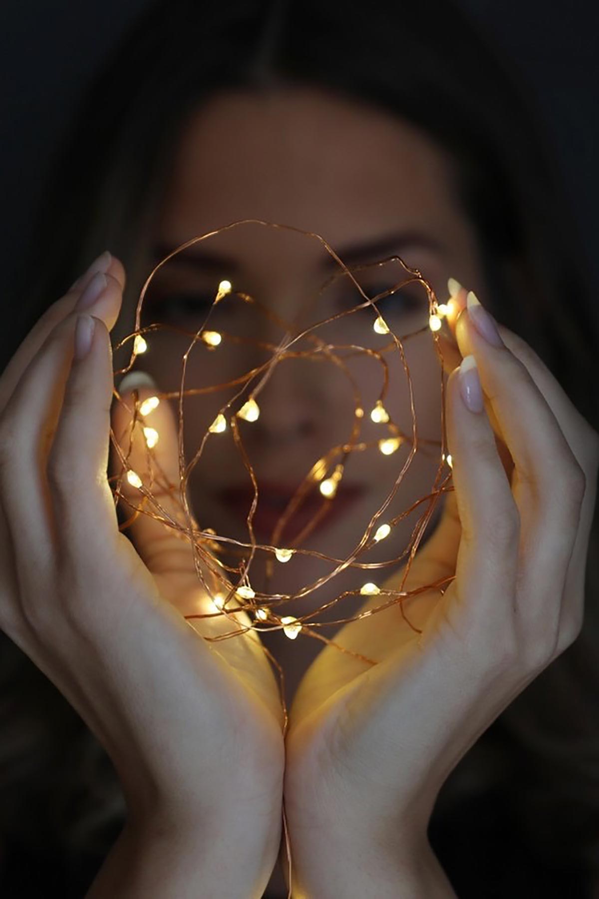 Lisa Angel 30 Battery Powered LED Copper Wire String Lights glowing on surface