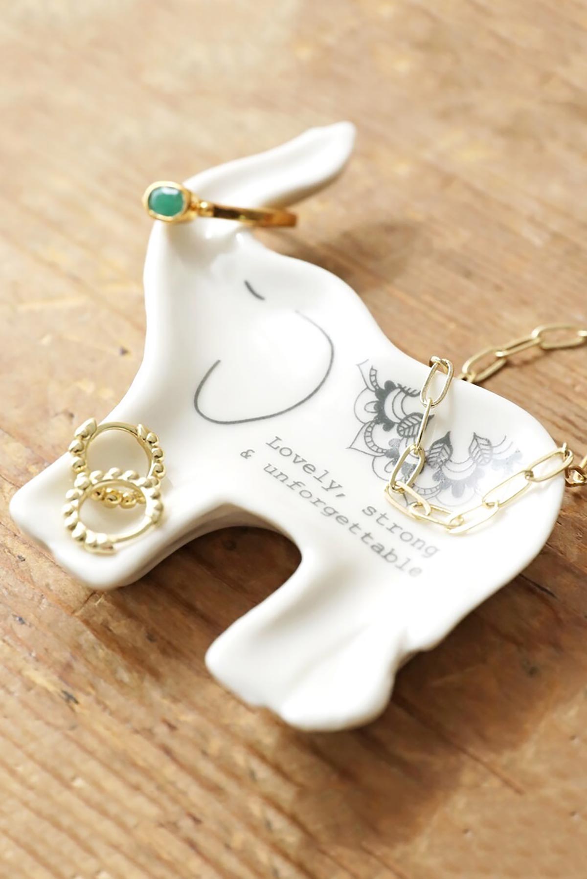 Elephant trinket dish holding jewellery