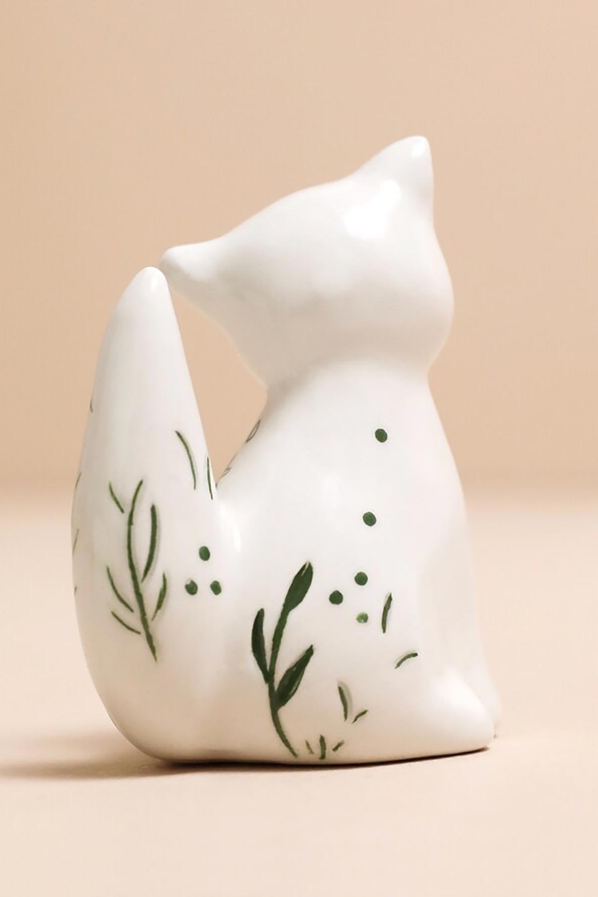 Close-up of ceramic fox ring stand