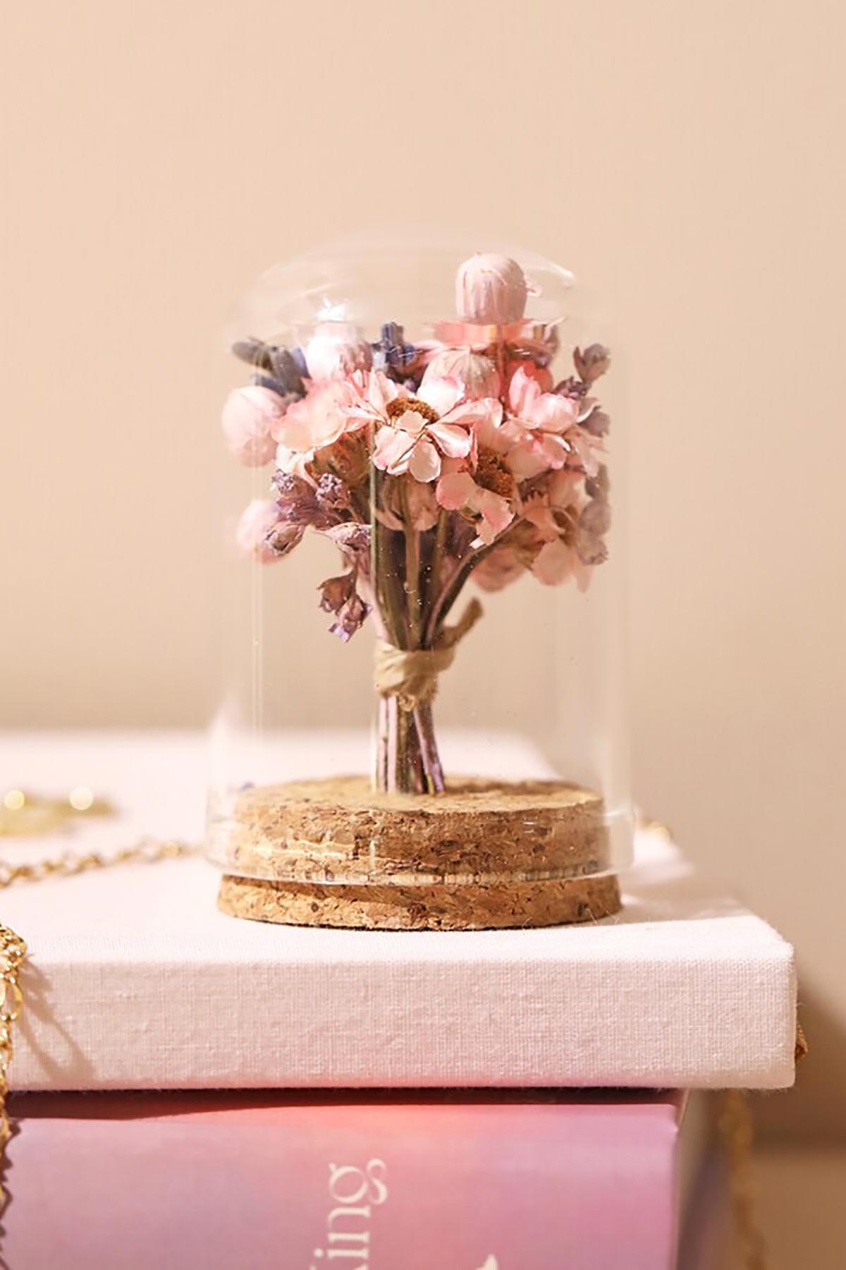 Lisa Angel Mini Dried Flower Glass Dome close-up of dried petals on table