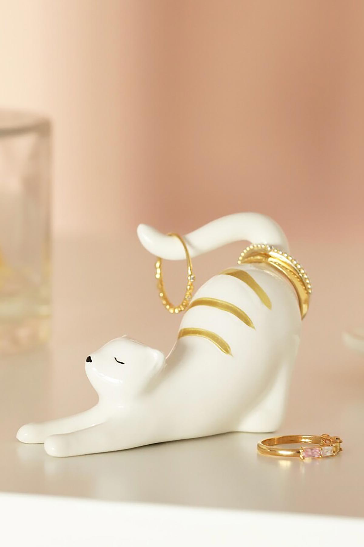 Close-up of ceramic stretching cat holder