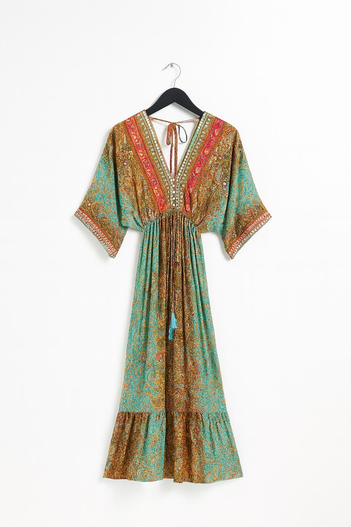 Close-up of Monsoon Muse Silk Blend Maxi Dress showing border details and tassels