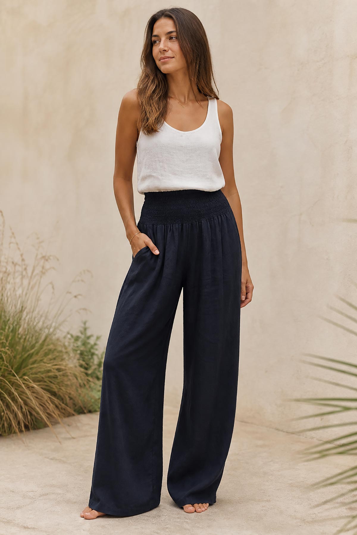Detail view of navy linen wide leg palazzo trousers by Urban Wild