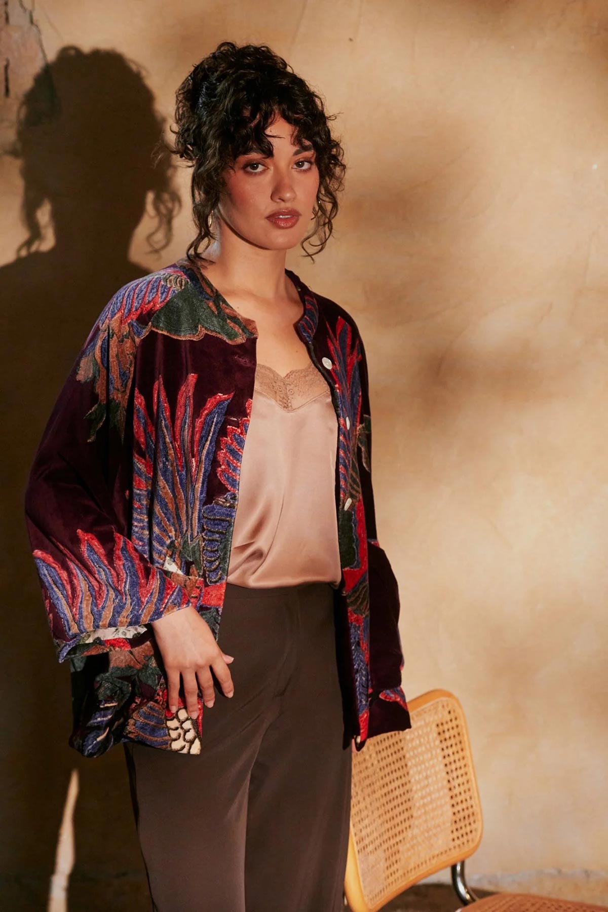 Model wearing Crane Plum Velvet Jacket