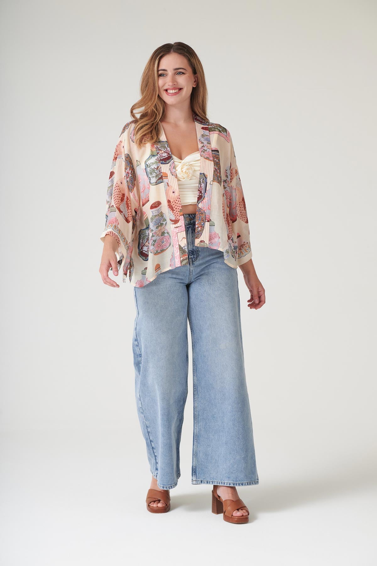 Bold perfume motif layering piece