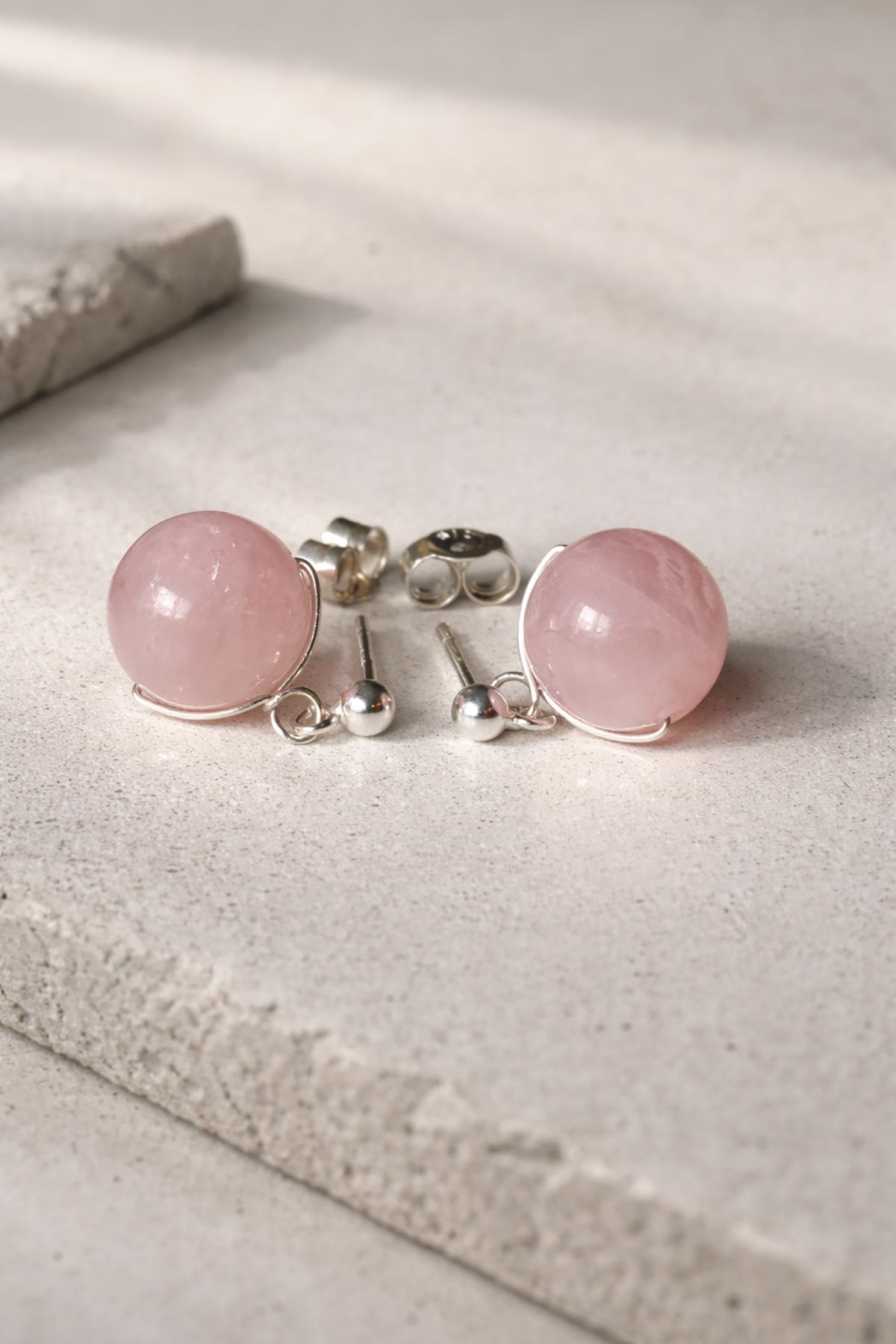 Rose quartz stud earrings detail view
