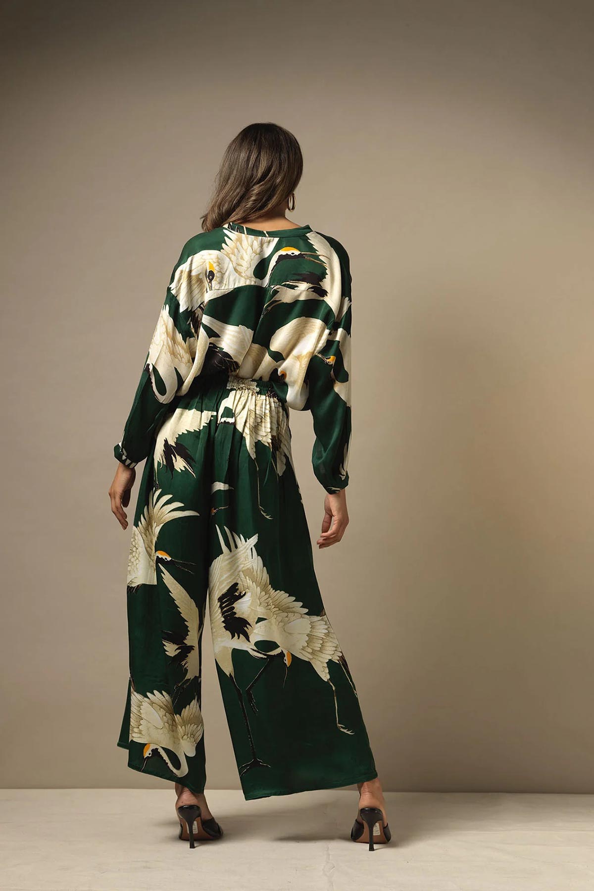 Model wearing stork forest Darcy print shirt by One Hundred Stars – available at Urban Wild