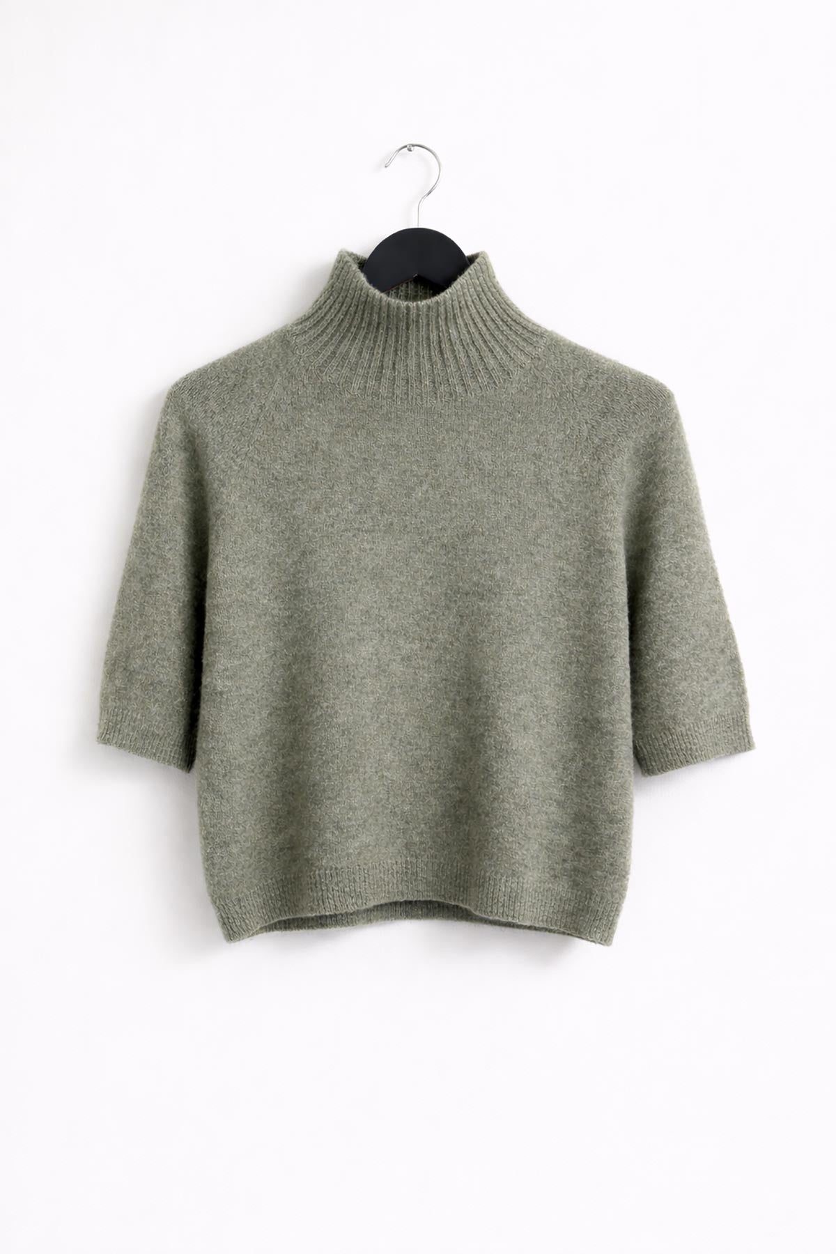 Green seamless turtleneck knit top with cropped fit made in Italy