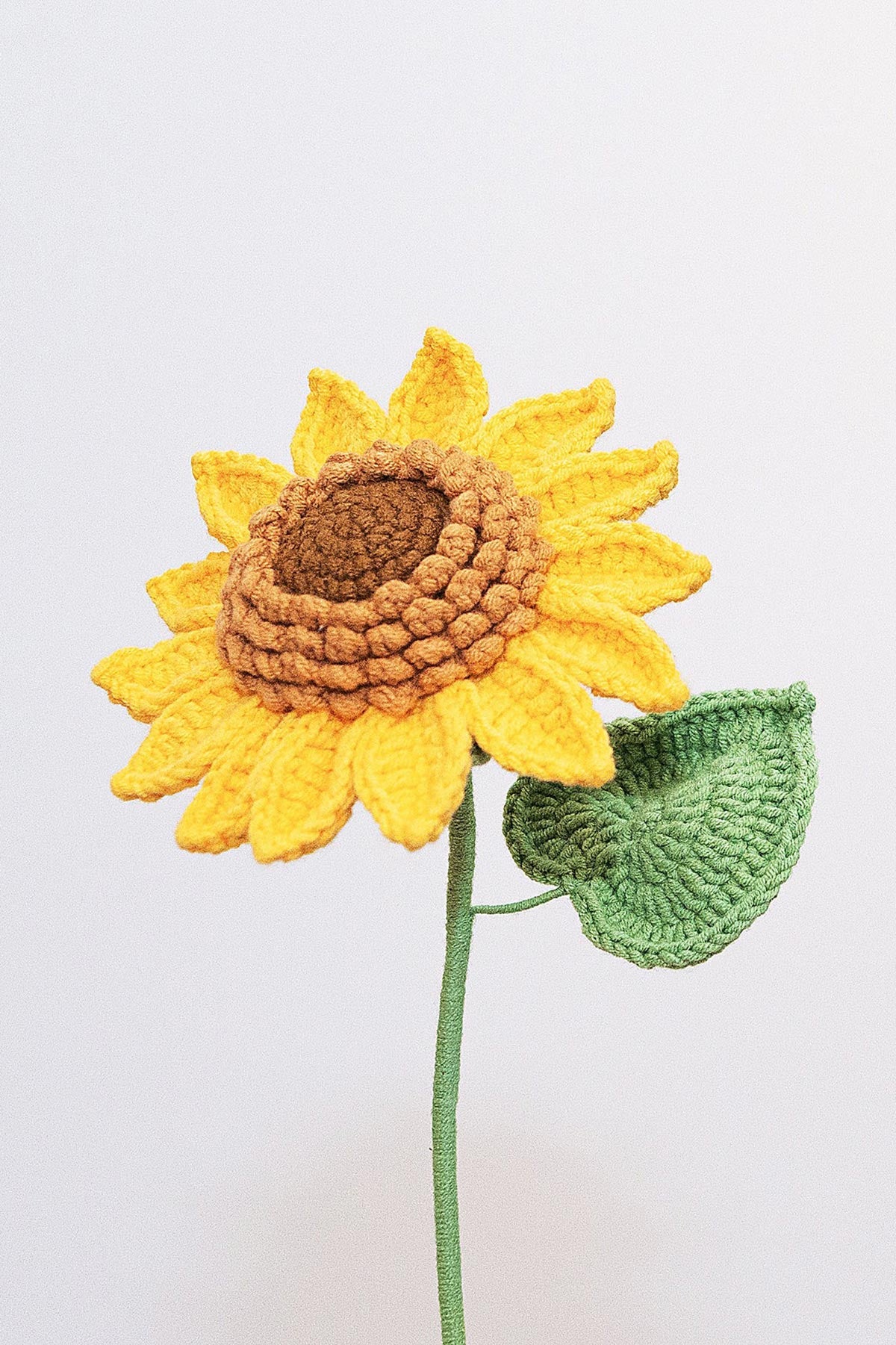 Sunflower crochet flower stem handmade in cotton yarn, styled for warm and joyful home décor at Urban Wild