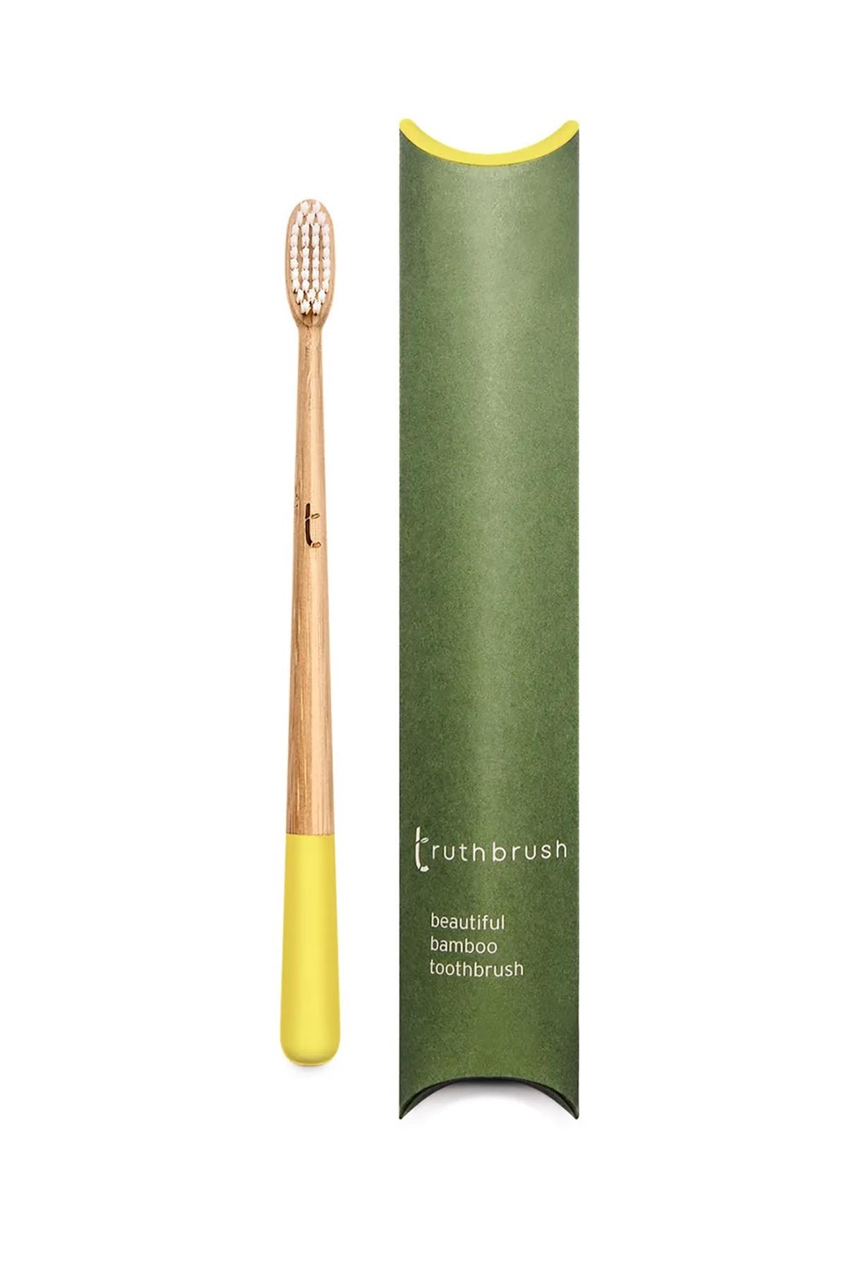 Yellow bamboo toothbrush by Truthbrush packaging