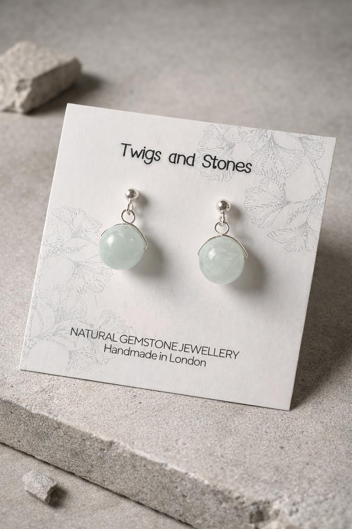 Close-up of aquamarine gemstone stud earrings