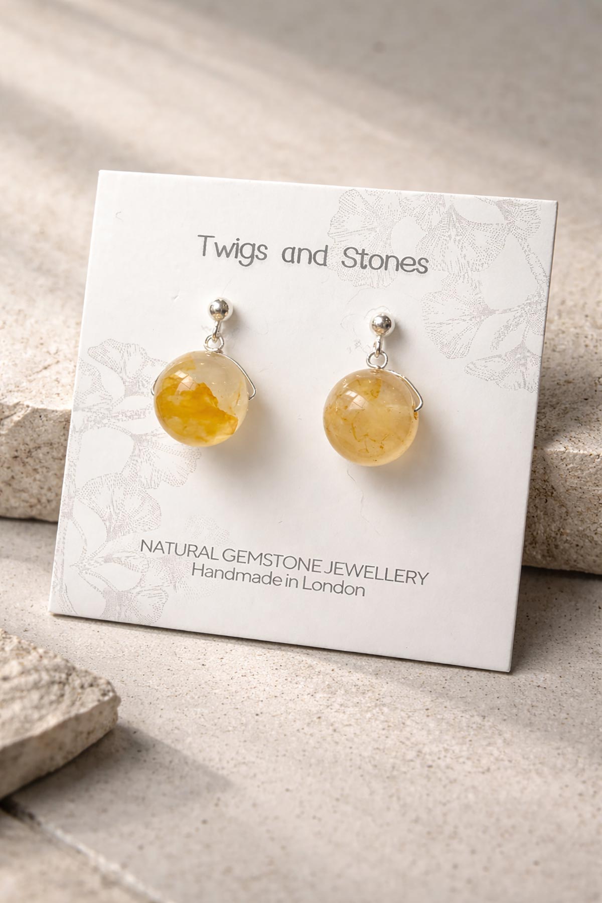 Close-up of honey quartz gemstone stud earrings