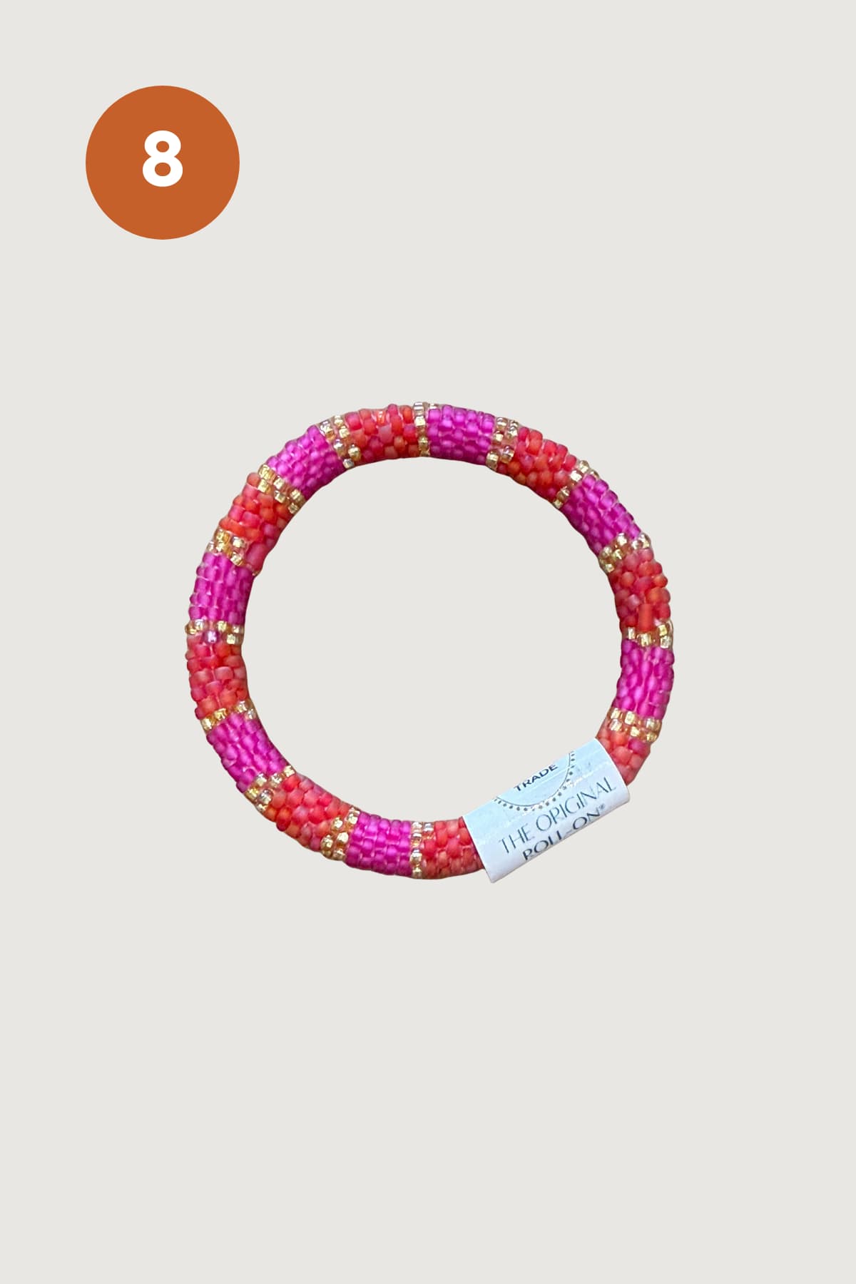 Magenta coral and gold striped beaded Roll-On bracelet Urban Wild