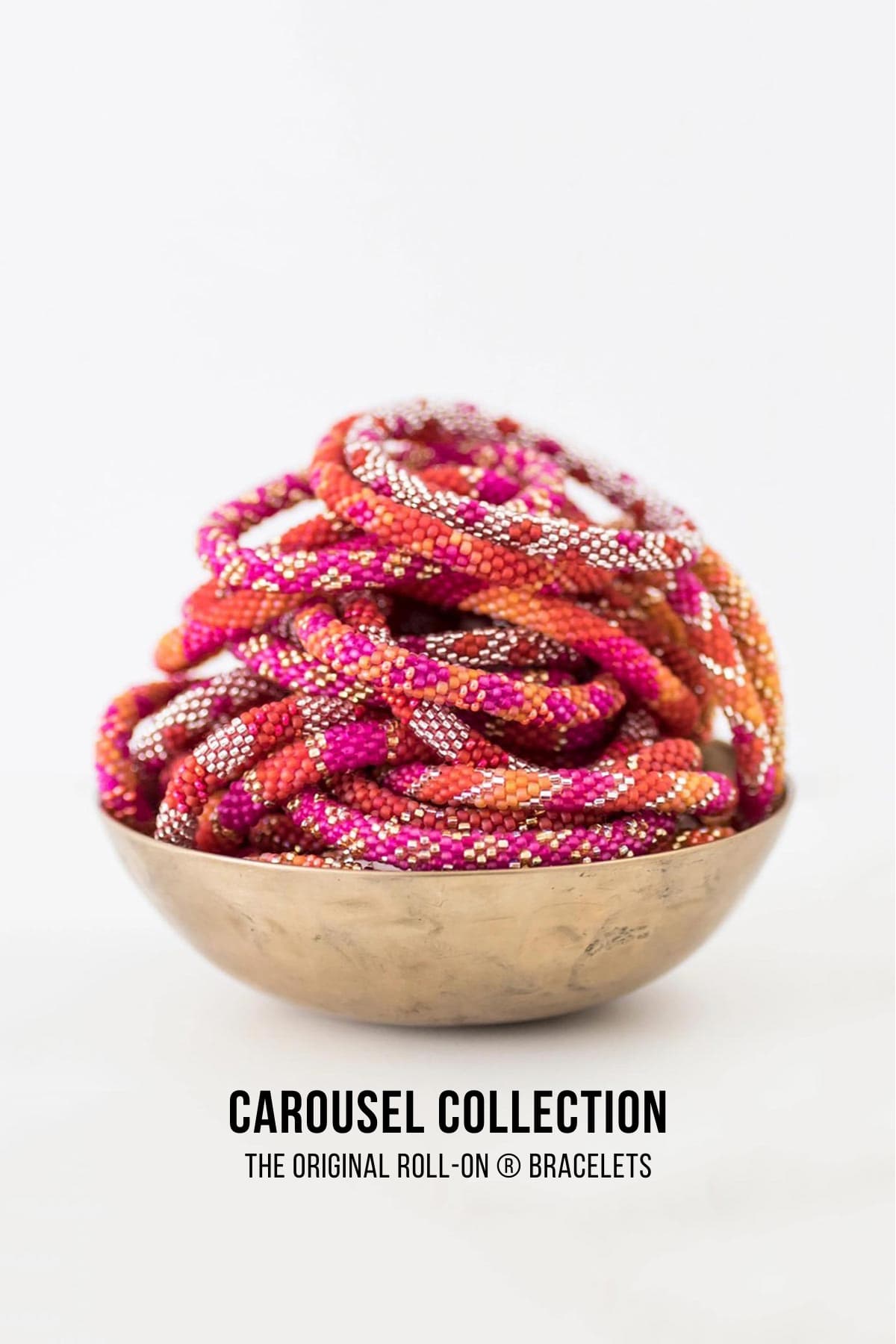 Carousel beaded Roll-On bracelet collection in pink red and orange in brass bowl Urban Wild