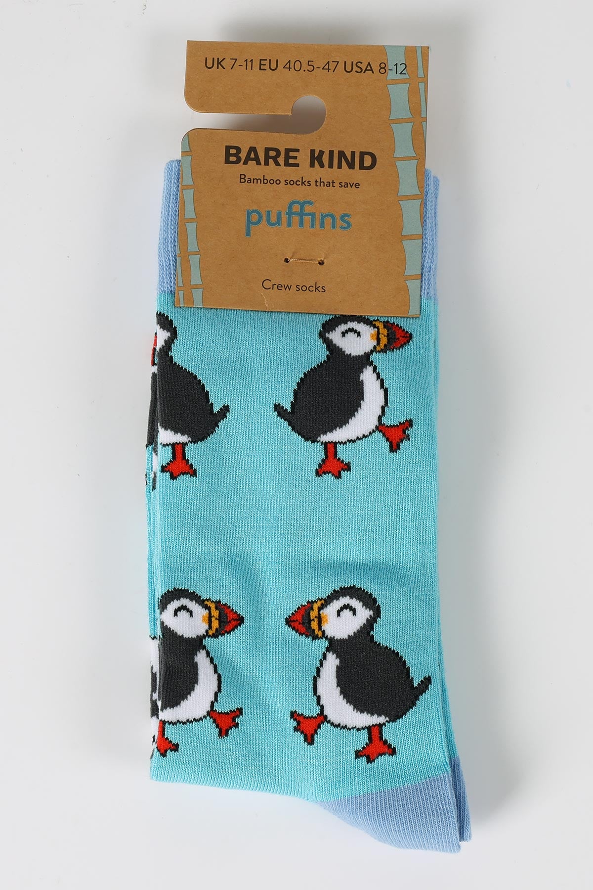 Blue bamboo crew socks with puffin print in Bare Kind packaging, ethical wildlife gift from Urban Wild