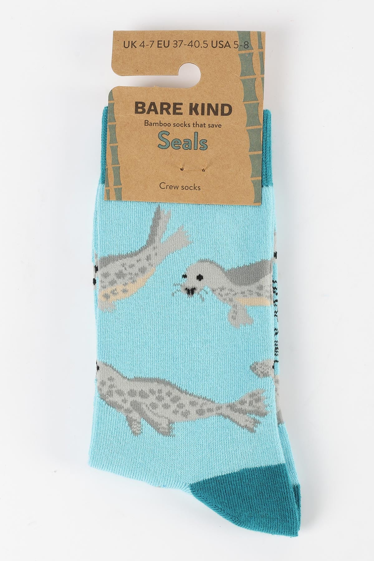 Blue bamboo crew socks with grey seal print by Bare Kind in branded packaging — Urban Wild
