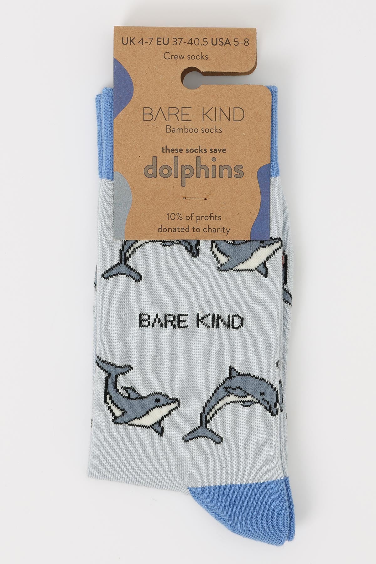 Blue bamboo crew socks with dolphin print in eco kraft packaging by Bare Kind — Urban Wild