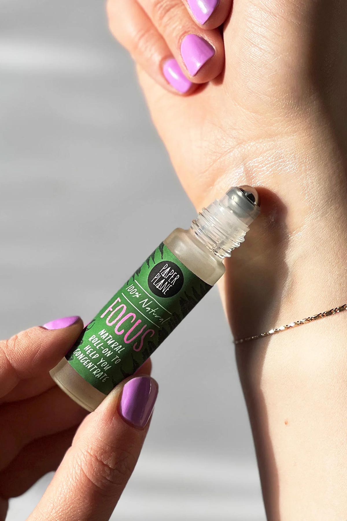 Focus pulse point roller oil being applied to wrist for concentration and calm — Urban Wild