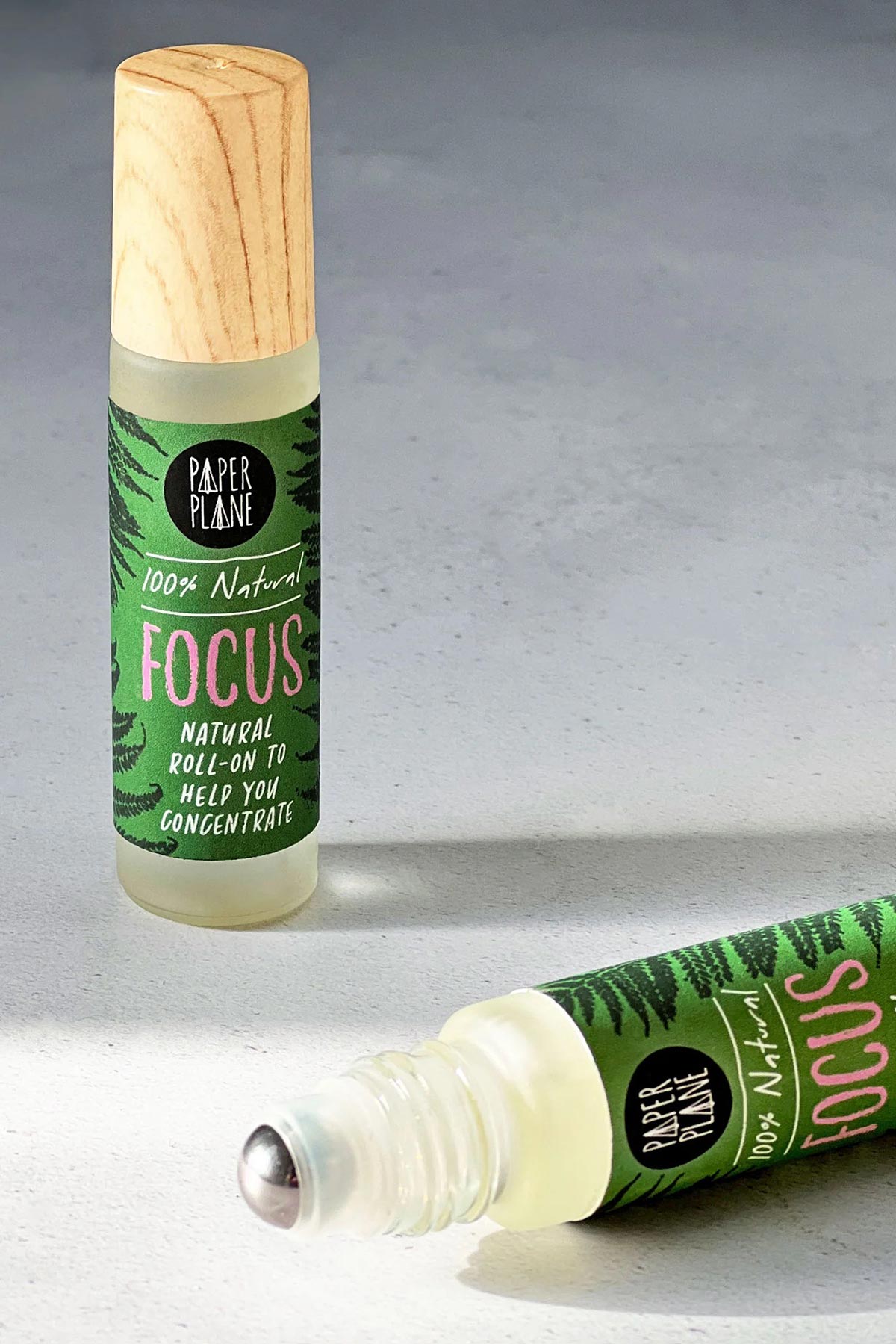 Focus natural pulse point roller oil in frosted glass bottle with wooden cap by Paper Plane — Urban Wild