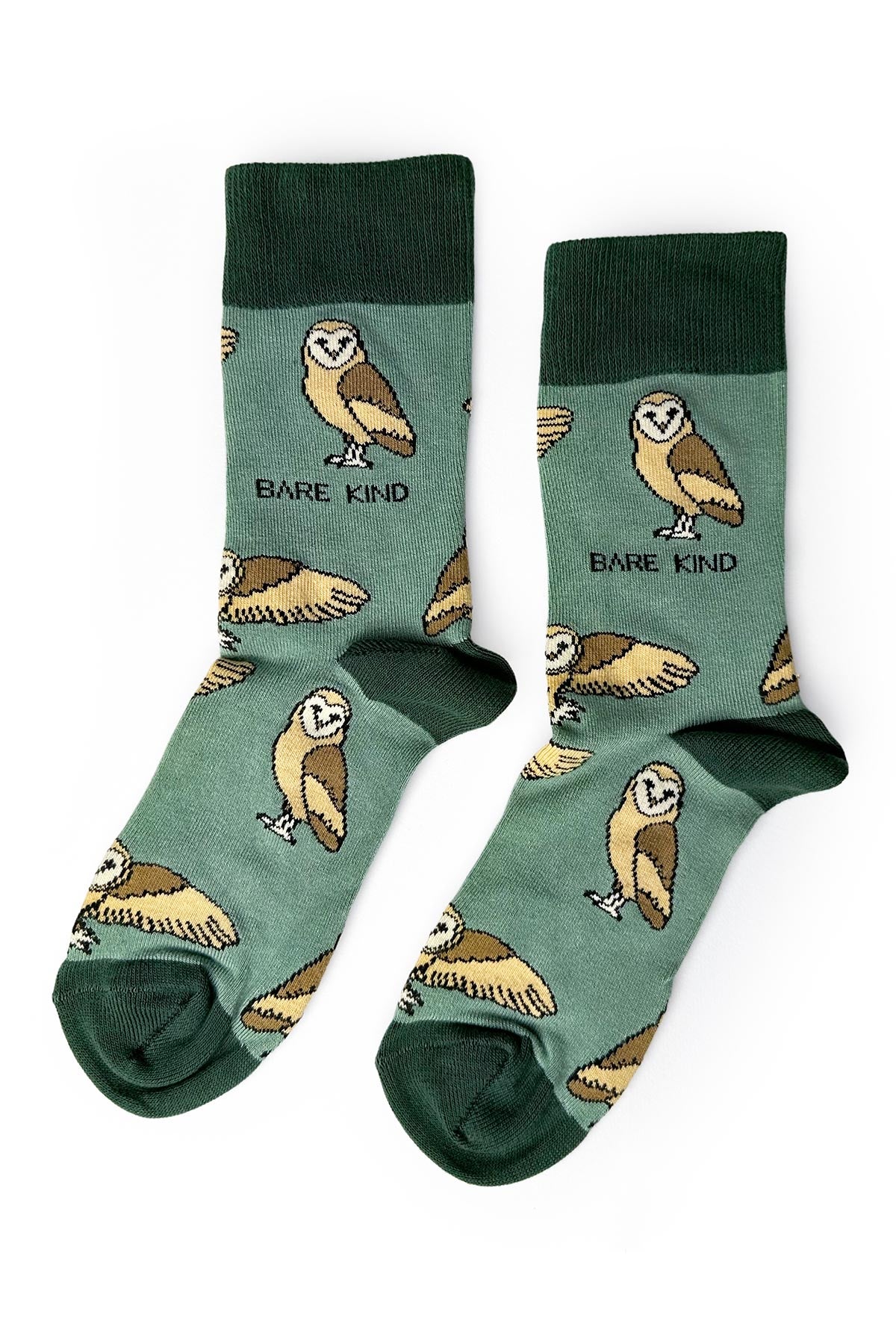 Pair of sage green bamboo crew socks featuring barn owl print by Bare Kind — Urban Wild
