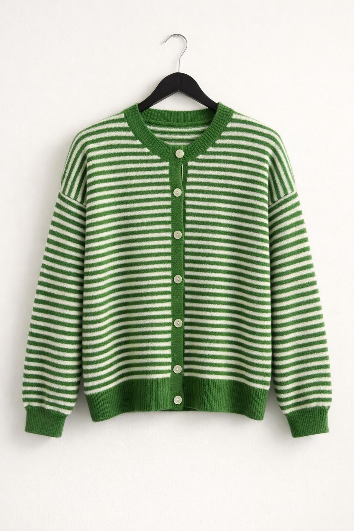 Urban Wild green and white cardigan styled for everyday layering