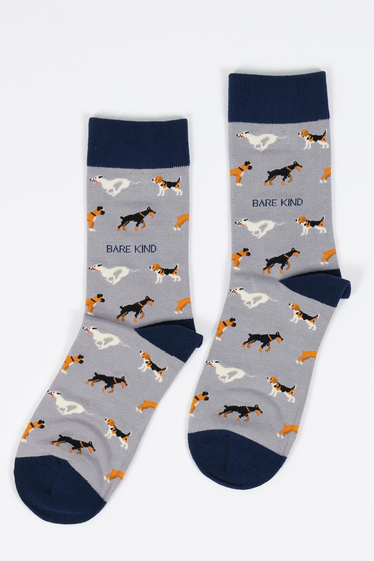 Pair of grey bamboo crew socks with navy heel and toe, featuring a multi-breed dog print — Urban Wild