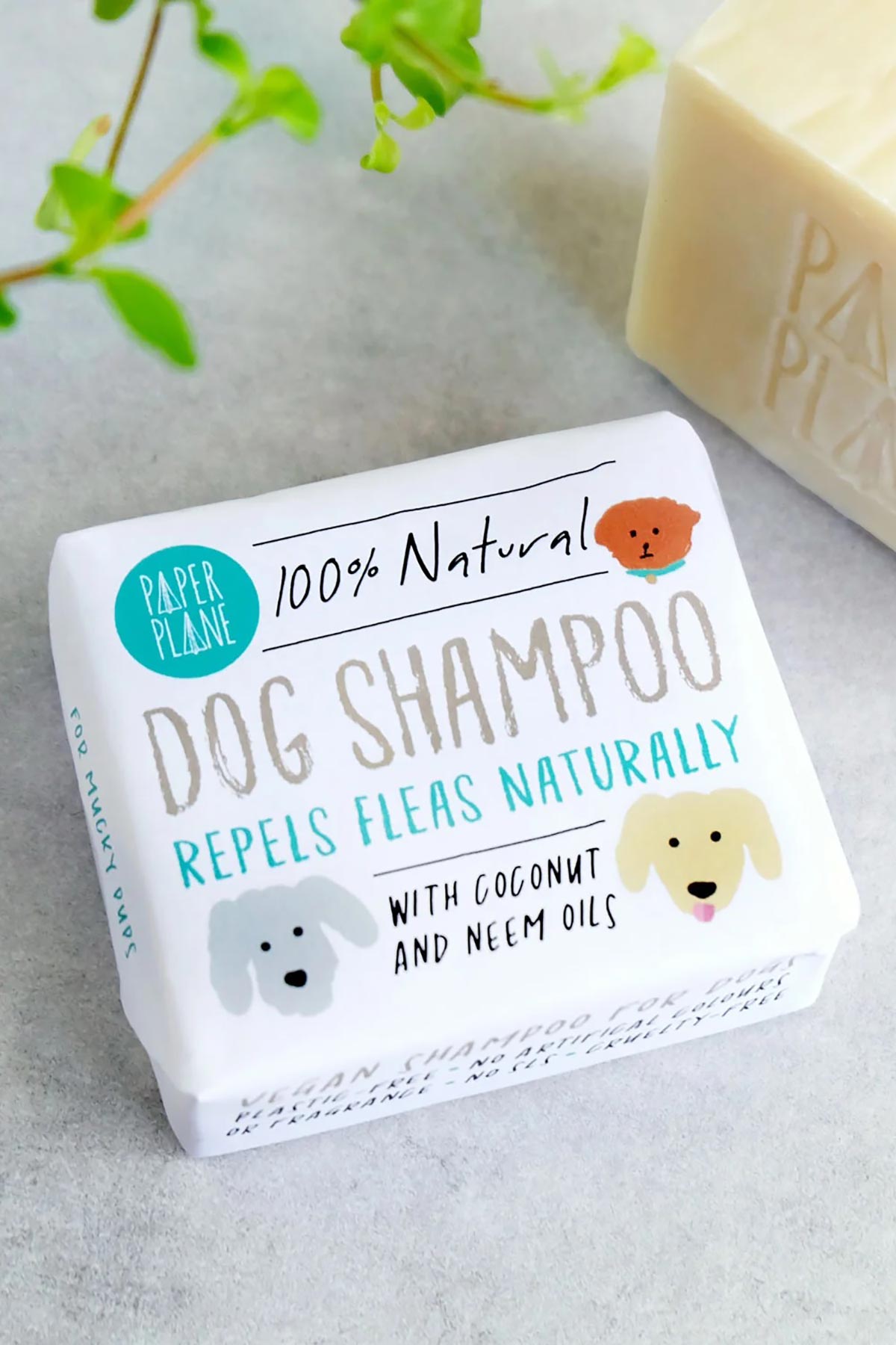Natural vegan dog shampoo bar with coconut and neem oils in plastic free wrap — Urban Wild