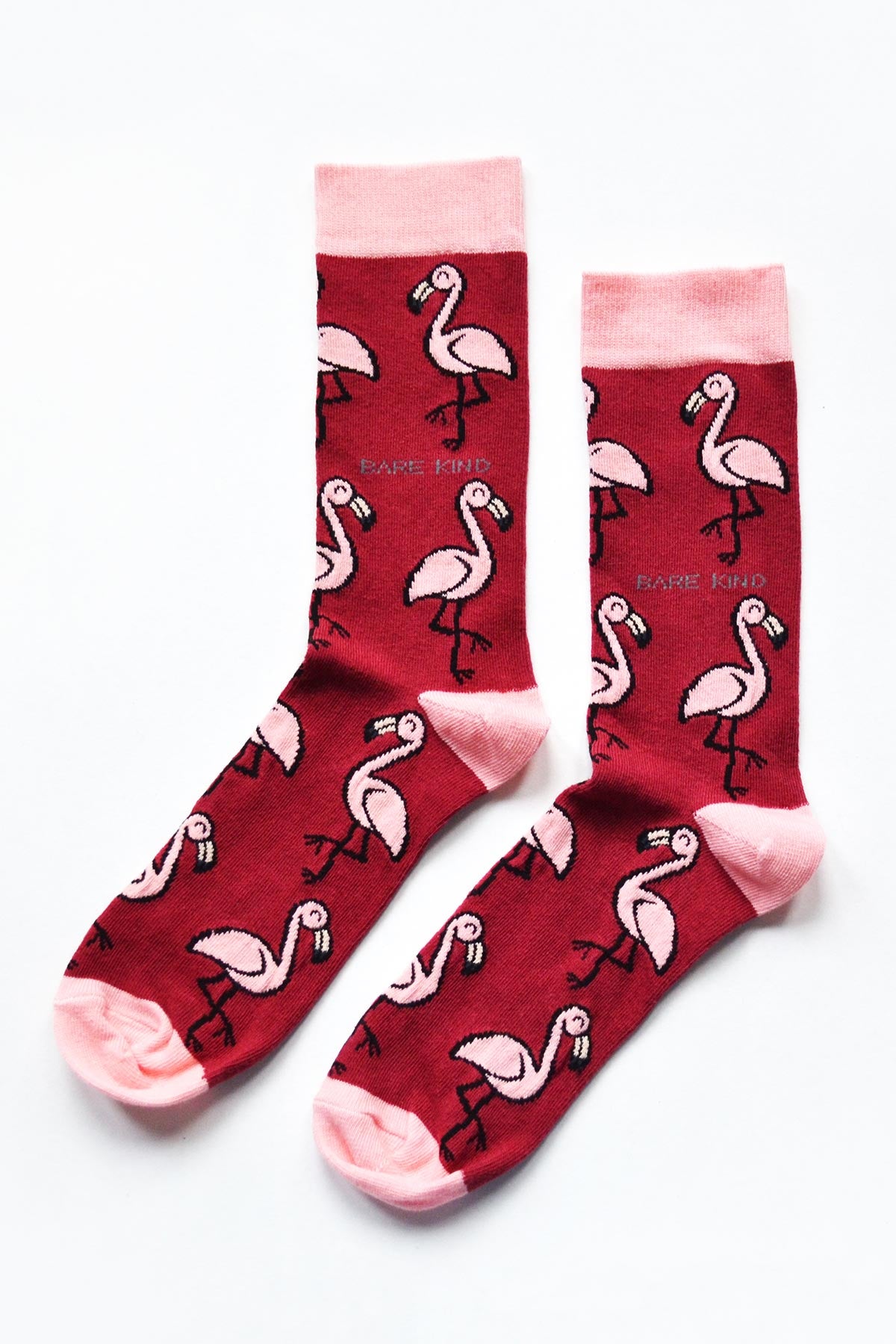Pair of pink flamingo bamboo crew socks flat lay showing all over flamingo motif — Urban Wild