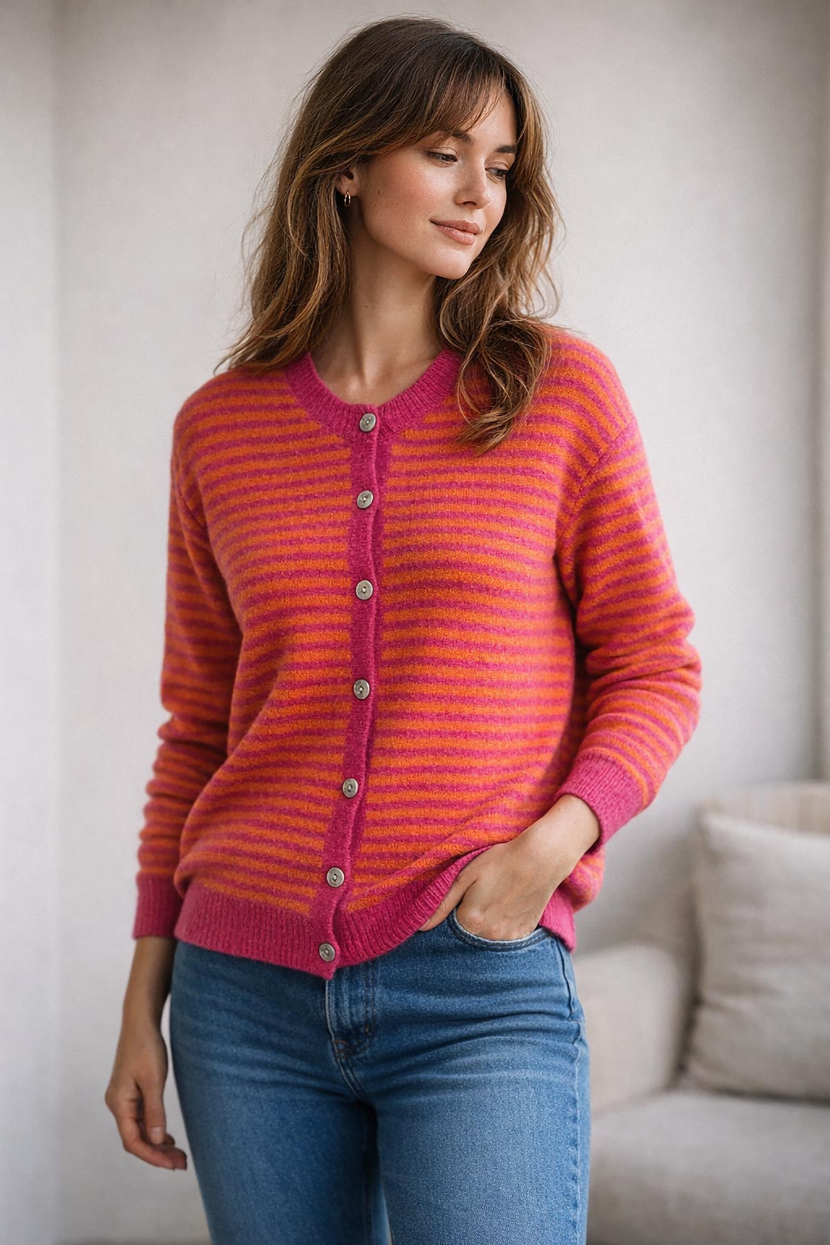 Urban Wild pink striped cardigan styled with relaxed denim