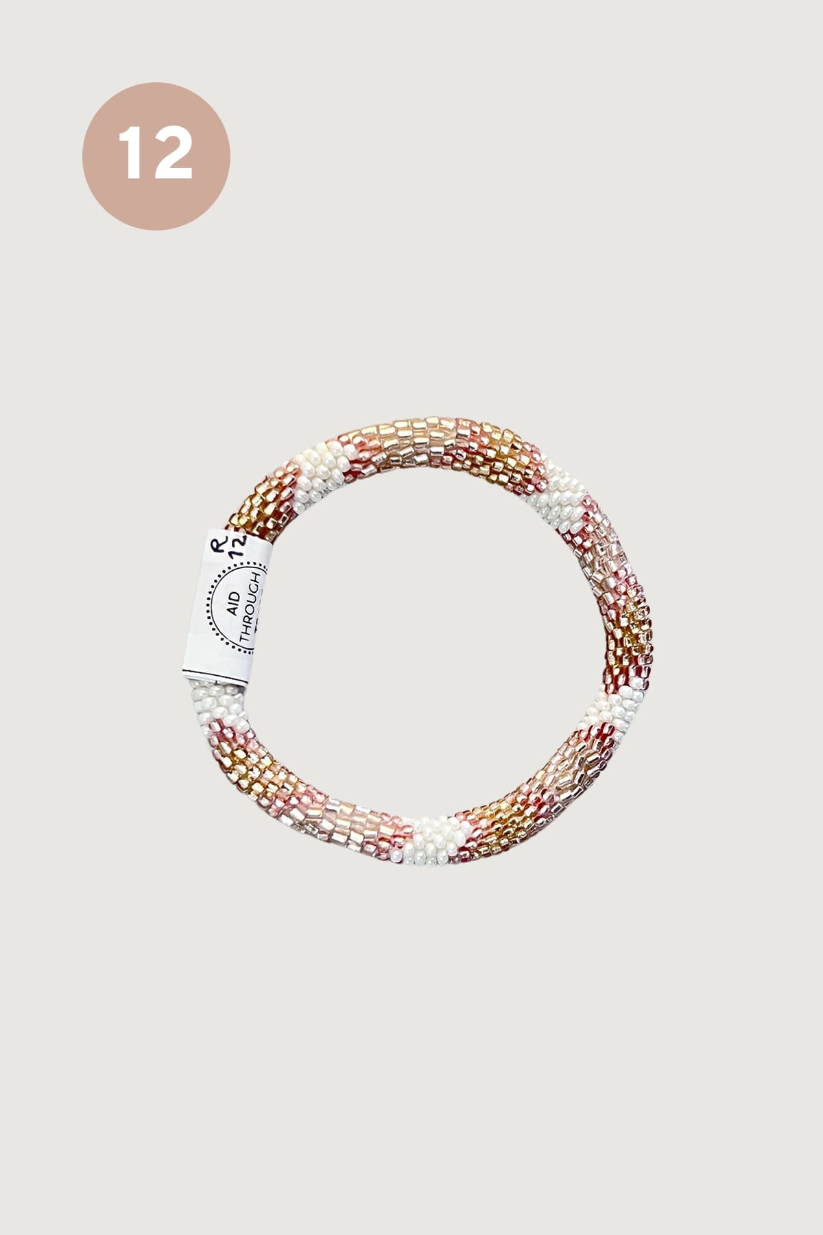 Rose gold and ivory beaded Roll-On bracelet design twelve handmade in Nepal - Urban Wild